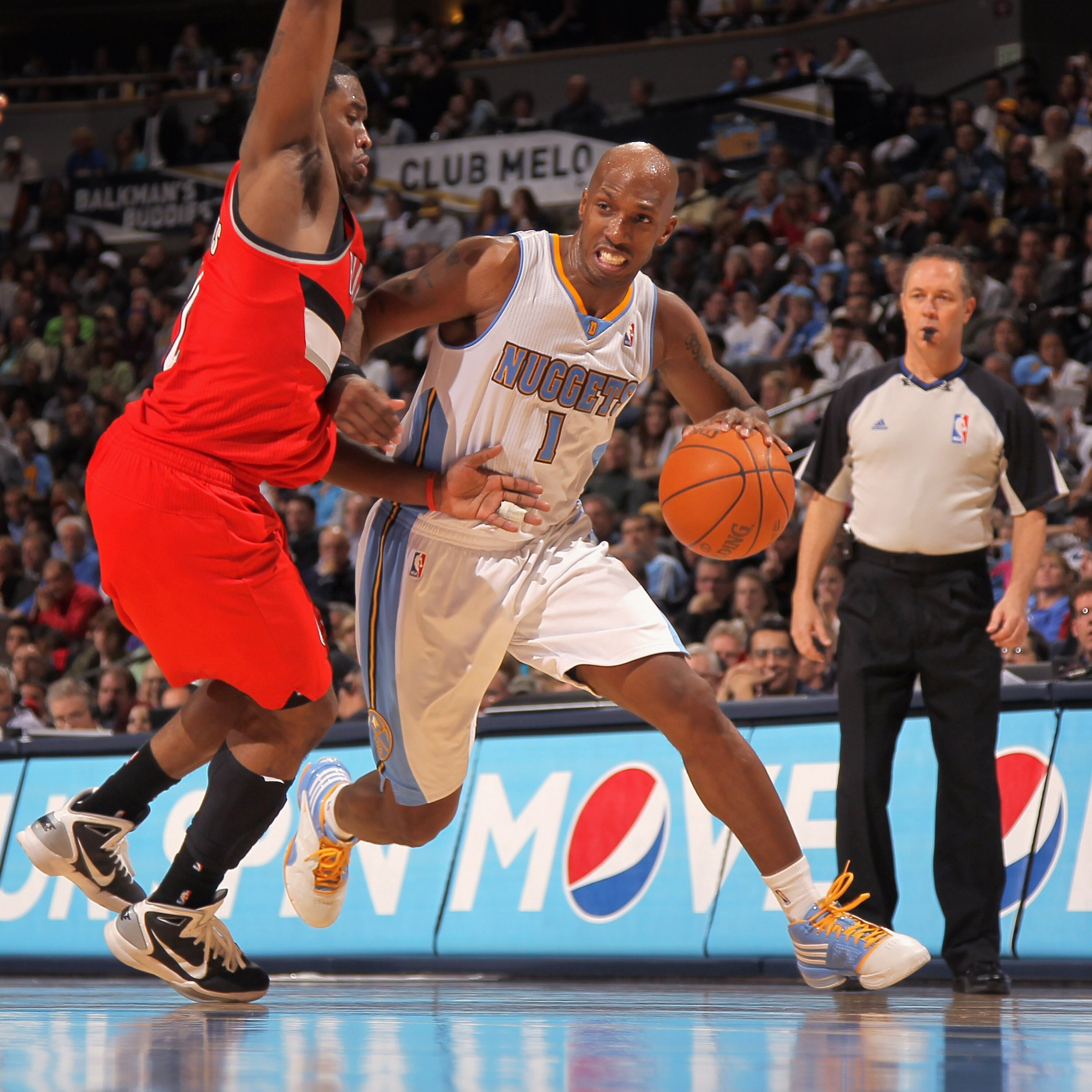 DENVER - DECEMBER 28:  Chauncey Billups #1 of the Denver Nuggets drives around Wesley Matthews #2 of the Portland Trail Blazers at Pepsi Center on December 28, 2010 in Denver, Colorado. The Nuggets defeated the Blazers 95-77. NOTE TO USER: User expressly
