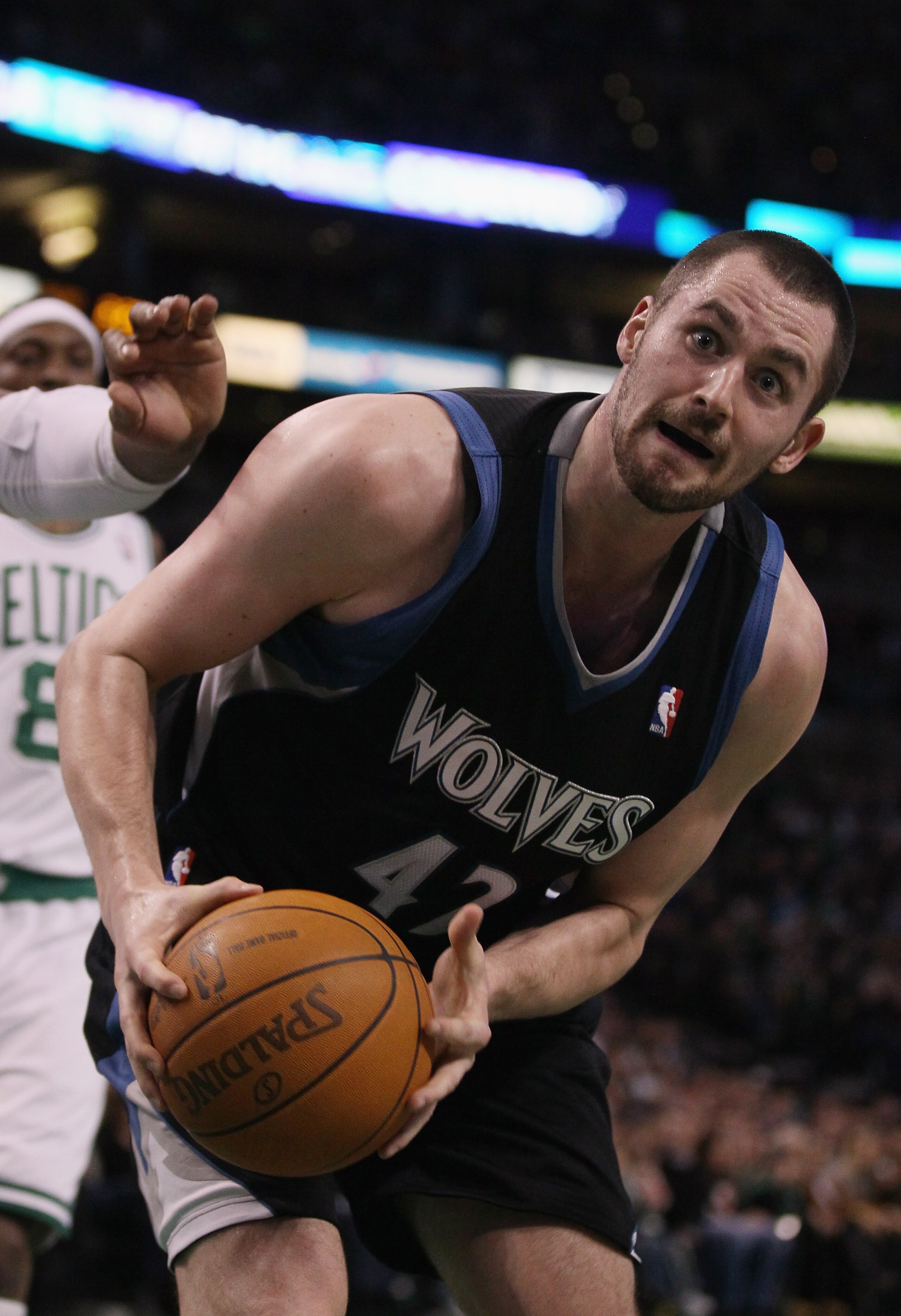 BOSTON, MA - JANUARY 03:  Kevin Love #42 of the Minnesota Timberwolves grabs the rebound in the first half against the Boston Celtics on January 3, 2011 at the TD Garden in Boston, Massachusetts. NOTE TO USER: User expressly acknowledges and agrees that,