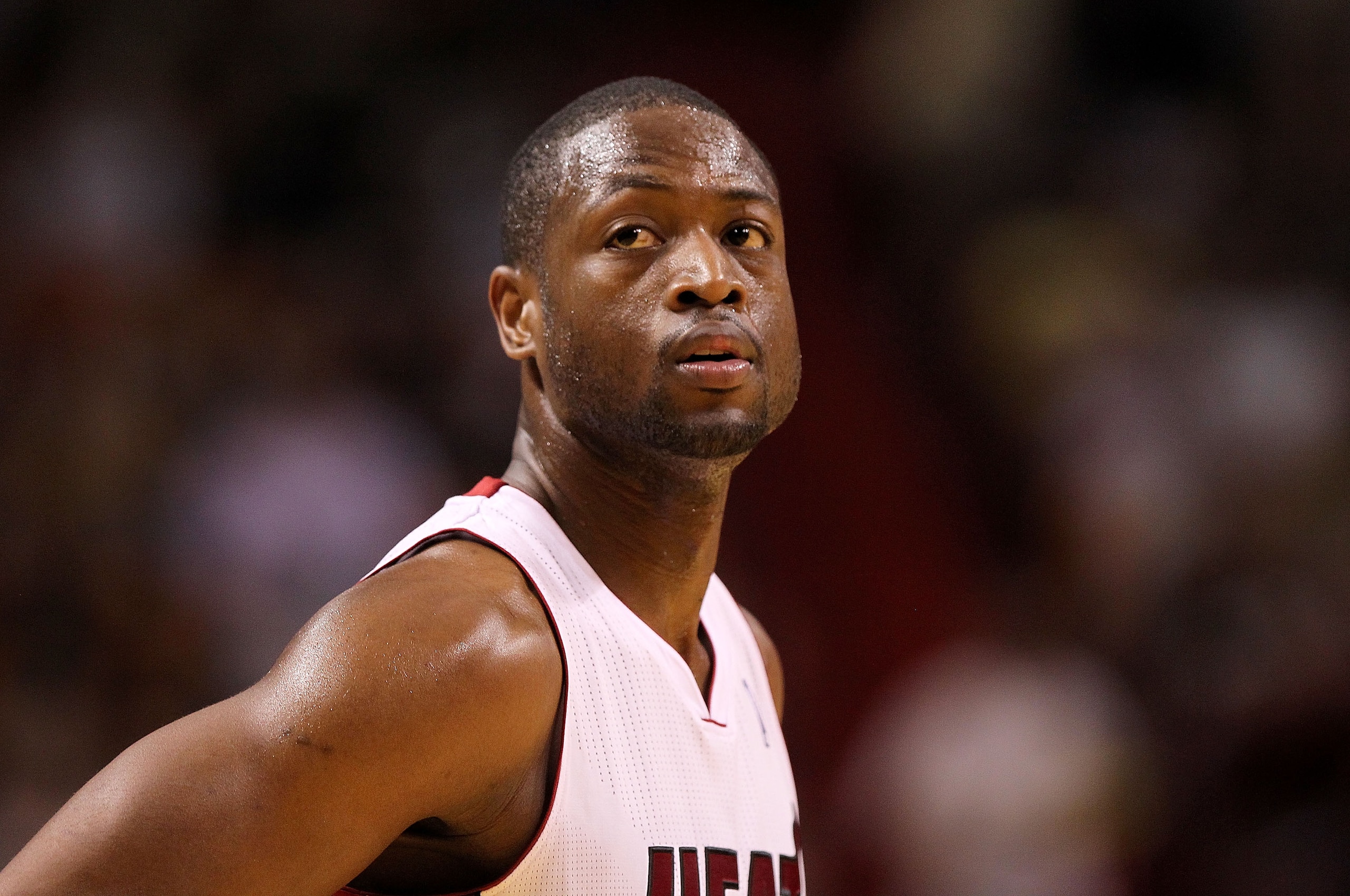 MIAMI, FL - FEBRUARY 25:  Dwyane Wade #3 of the Miami Heat looks on during a game against the Washington Wizards at American Airlines Arena on February 25, 2011 in Miami, Florida. NOTE TO USER: User expressly acknowledges and agrees that, by downloading a