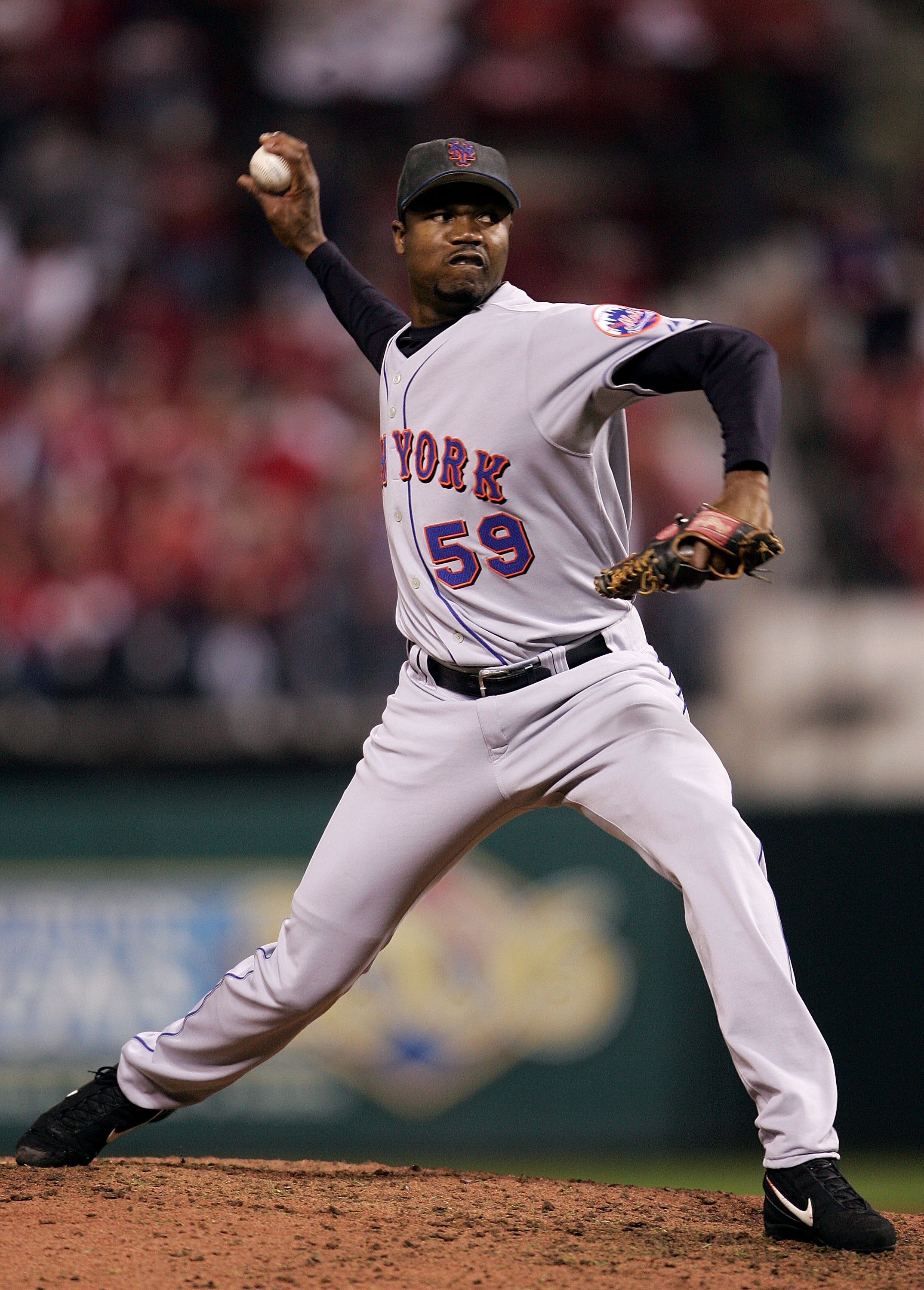 ST LOUIS, MO - OCTOBER 17:  Guillermo Mota #59 of the New York Mets pitches against the St. Louis Cardinals during game five of the NLCS at Busch Stadium on October 17, 2006 in St. Louis, Missouri.  (Photo by Elsa/Getty Images)