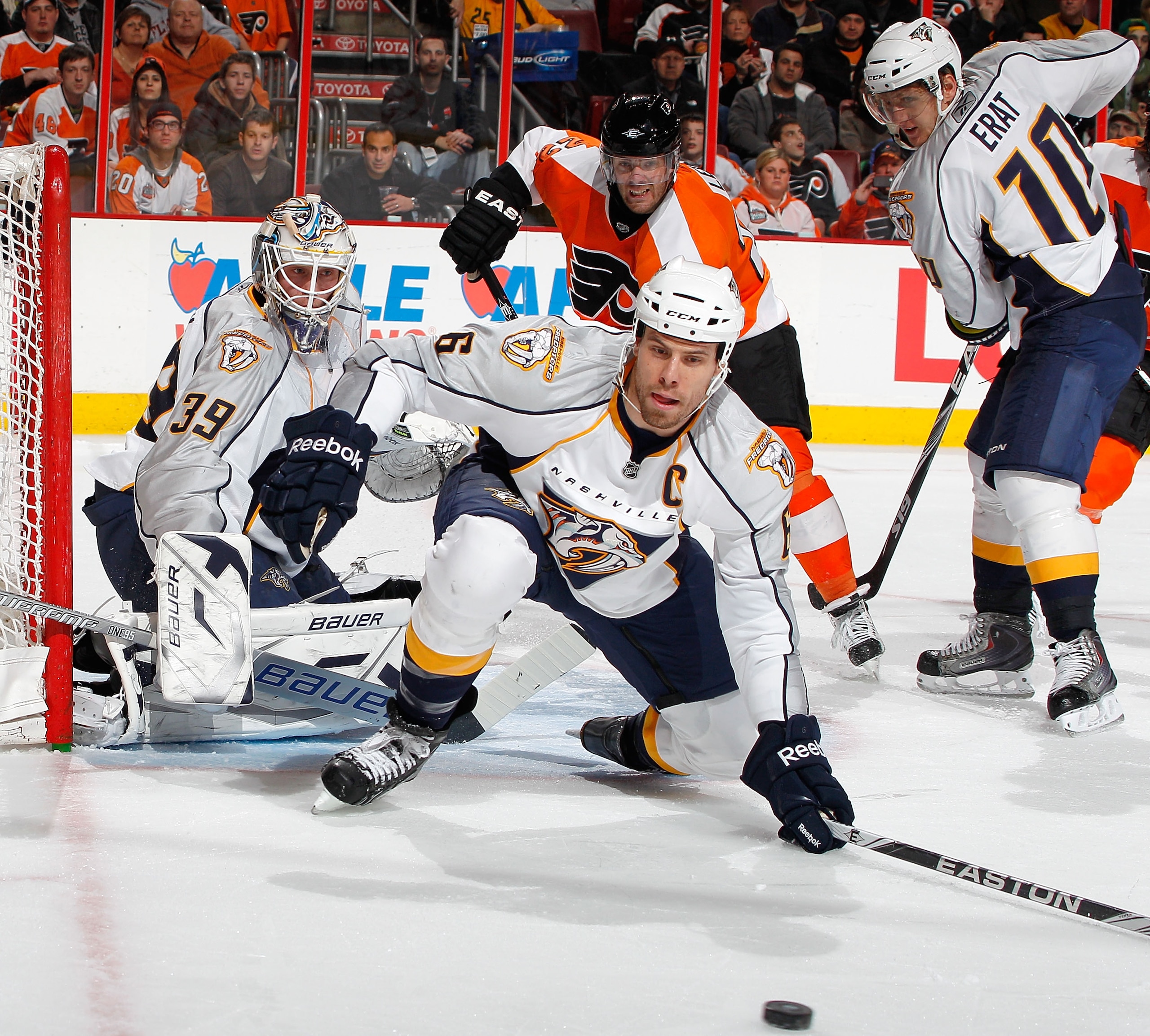 PHILADELPHIA, PA - FEBRUARY 03:  Goalie Anders Lindback #39 and Defenseman Shea Weber #6 of the Nashville Predators combine to defend against the Philadelphia Flyers during an NHL hockey game at the Wells Fargo Center on February 3, 2011 in Philadelphia,