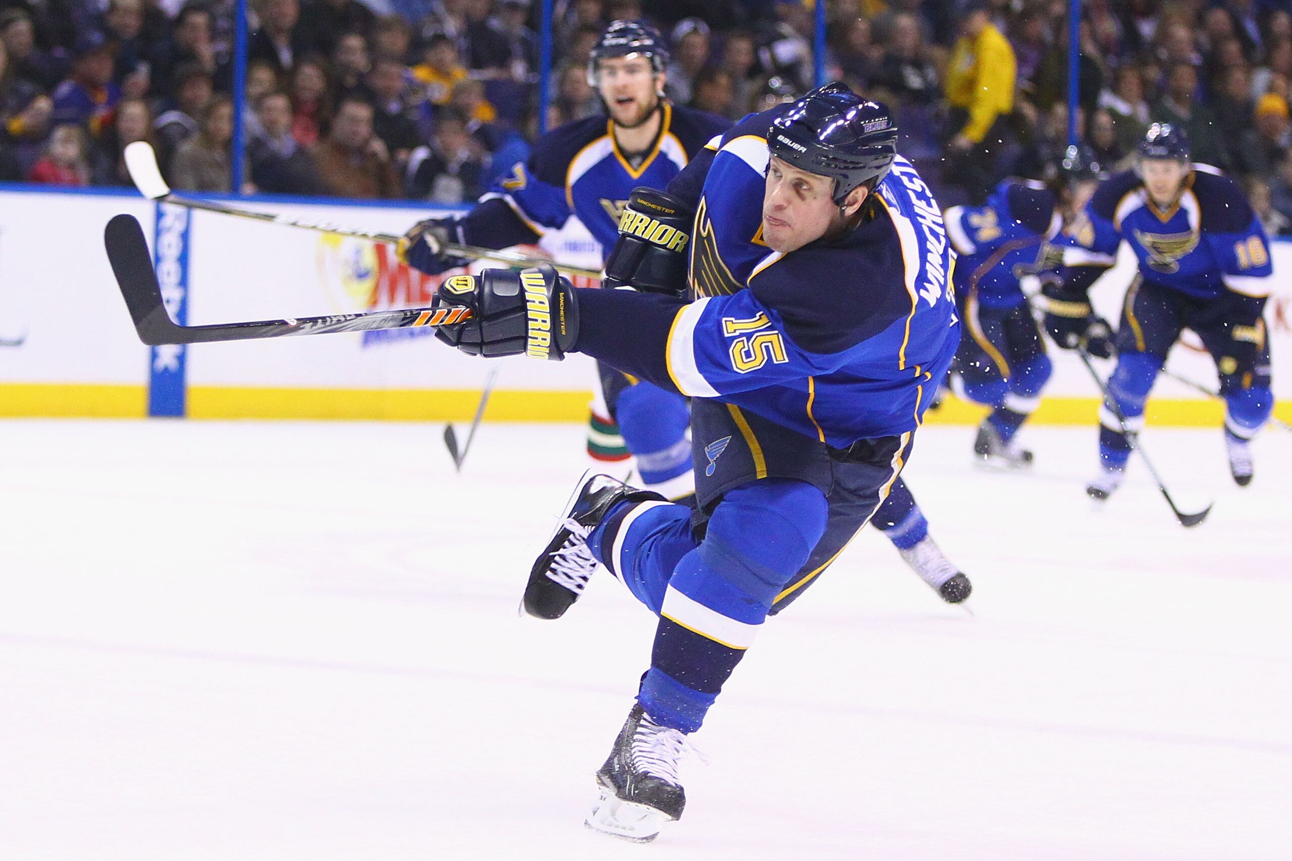 ST. LOUIS, MO - FEBRUARY 11: Brad Winchester #15 of the St. Louis Blues shoots the puck against the Minnesota Wild at the Scottrade Center on February 11, 2011 in St. Louis, Missouri.  (Photo by Dilip Vishwanat/Getty Images)