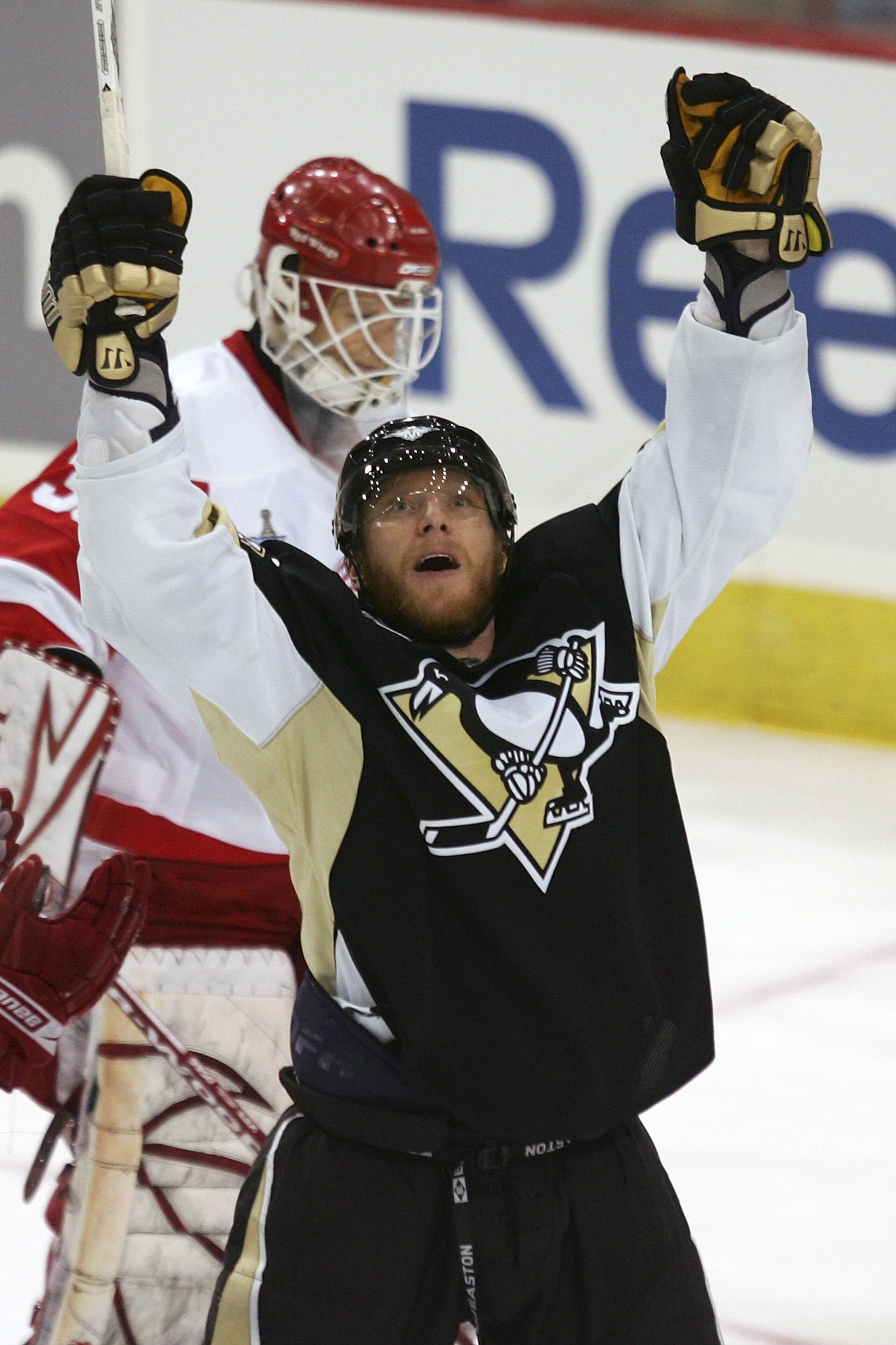 PITTSBURGH - JUNE 04:  Marian Hossa #18 of the Pittsburgh Penguins celebrates after scoring a late third period goal against goaltender Chris Osgood #30 of the Detroit Red Wings during game six of the 2008 NHL Stanley Cup Finals at Mellon Arena on June 4,