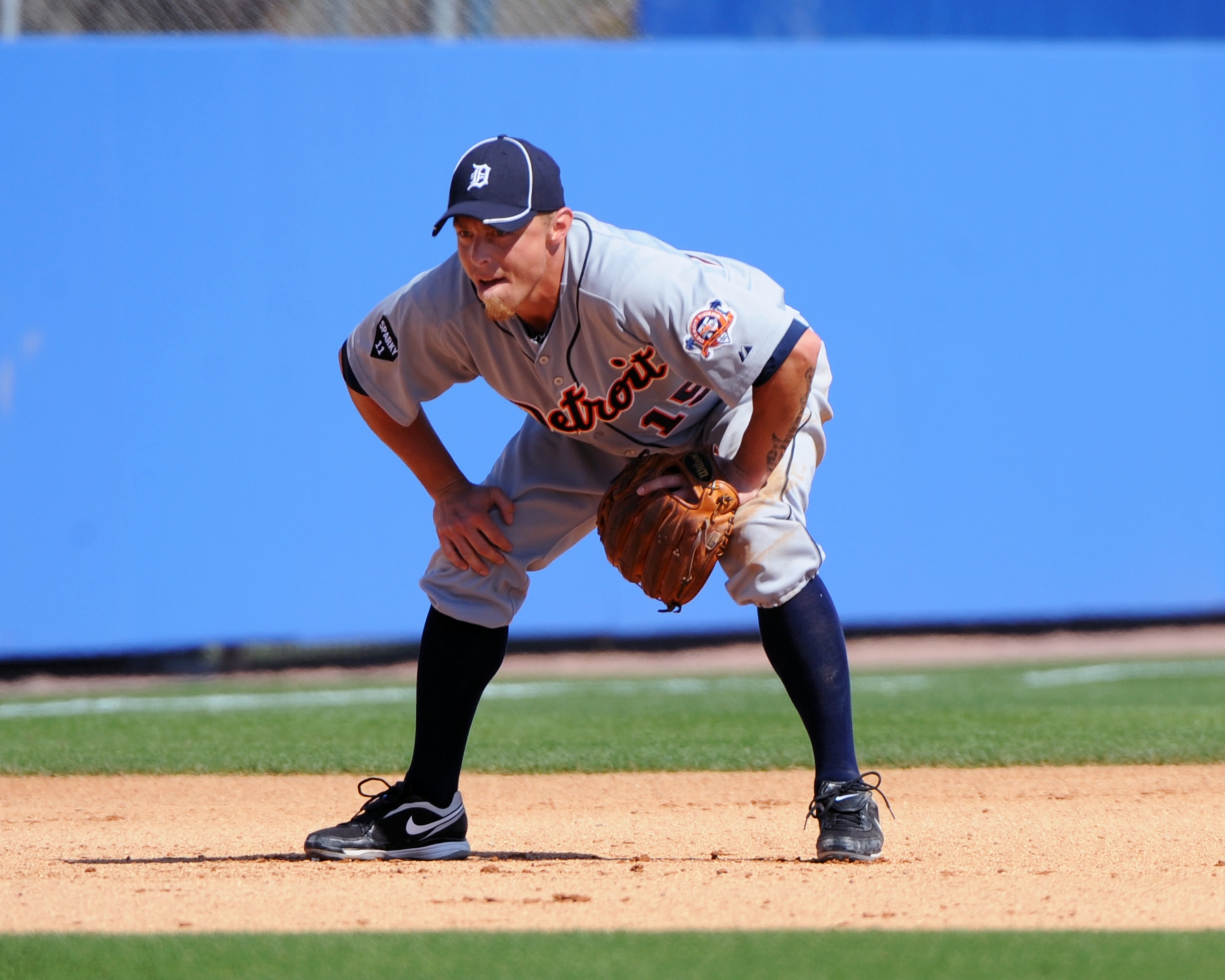 DUNEDIN, FL - FEBRUARY 26:  Infielder Brandon Inge #15 of the Detroit Tigers sets at third base against the Toronto Blue Jays February 26, 2011 at Florida Auto Exchange Stadium in Dunedin, Florida.  (Photo by Al Messerschmidt/Getty Images)