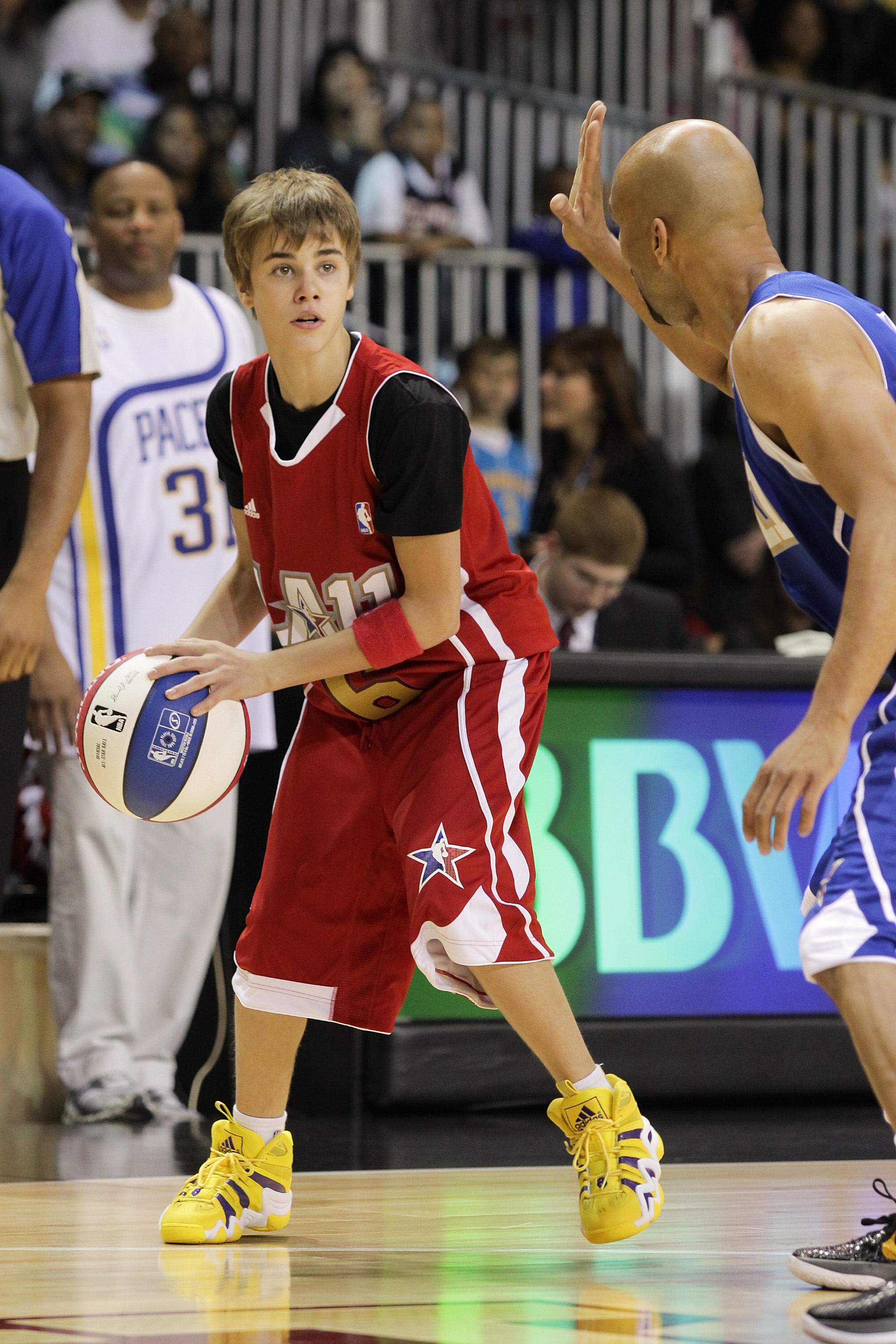 LOS ANGELES, CA - FEBRUARY 18:  Justin Bieber plays at the 2011 BBVA NBA All-Star Celebrity Game at the Los Angeles Convention Center on February 18, 2011 in Los Angeles, California.  (Photo by Noel Vasquez/Getty Images)
