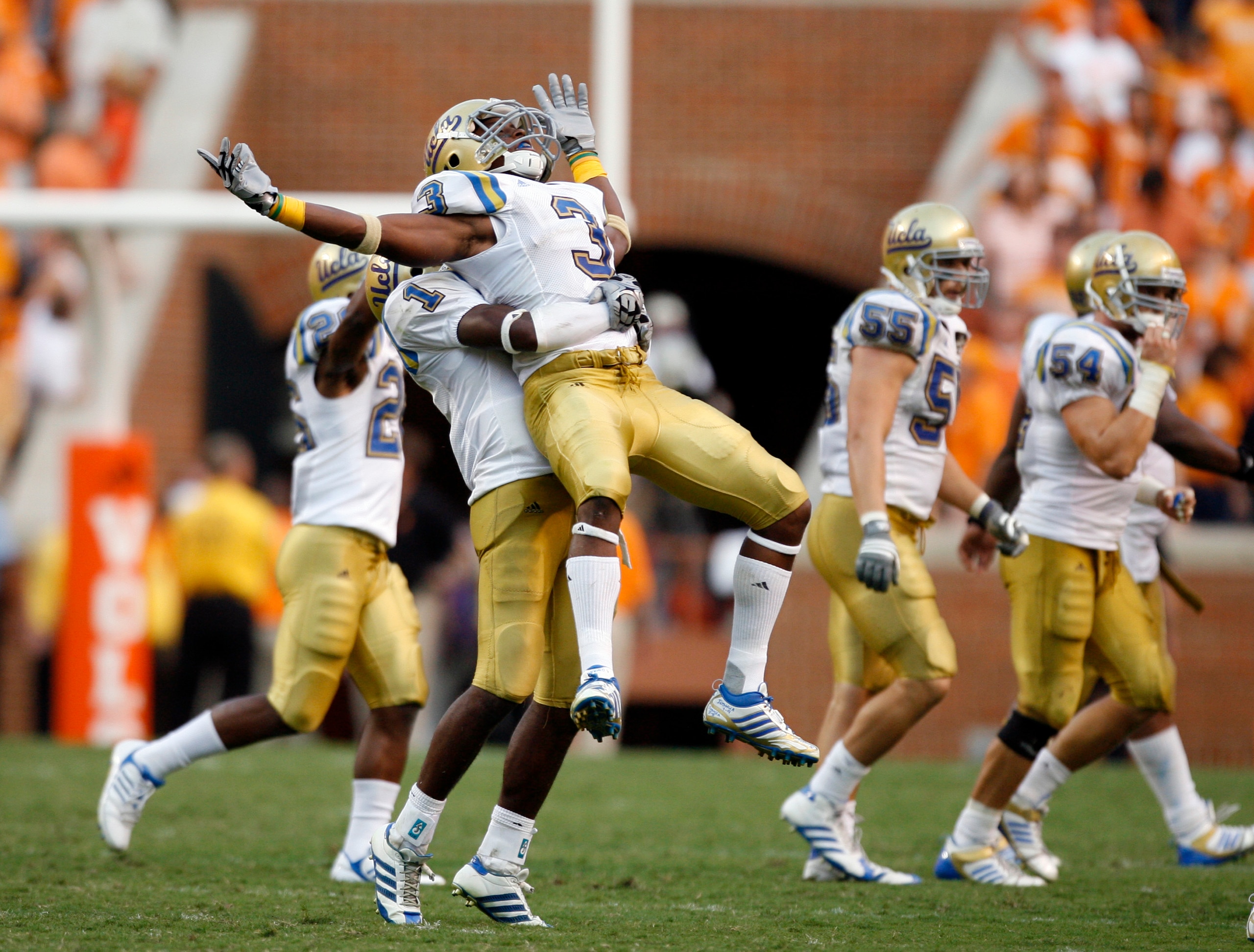 KNOXVILLE, TN - SEPTEMBER 12: Rahim Moore #3 and Alterraun Verner #1 of the UCLA Bruins celebrate at the end of the game against the Tennessee Volunteers on September 12, 2009 at Neyland Stadium in Knoxville, Tennessee. The Bruins beat the Volunteers 19-1 KNOXVILLE, TN - SEPTEMBER 12: Rahim Moore #3 and Alterraun Verner #1 of the UCLA Bruins celebrate at the end of the game against the Tennessee Volunteers on September 12, 2009 at Neyland Stadium in Knoxville, Tennessee. The Bruins beat the Volunteers 19-1