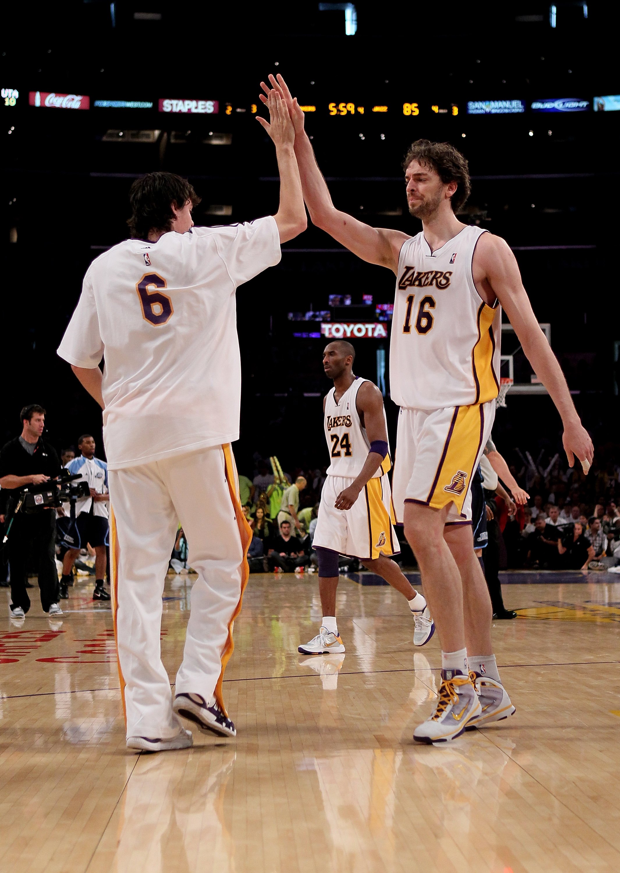 LOS ANGELES - MAY 2:  Pau Gasol #16 of the Los Angeles Lakers high fives with Adam Morrison #6 against the Utah Jazz during Game One of the Western Conference Semifinals of the 2010 NBA Playoffs on May2, 2010 at Staples Center in Los Angeles, California.