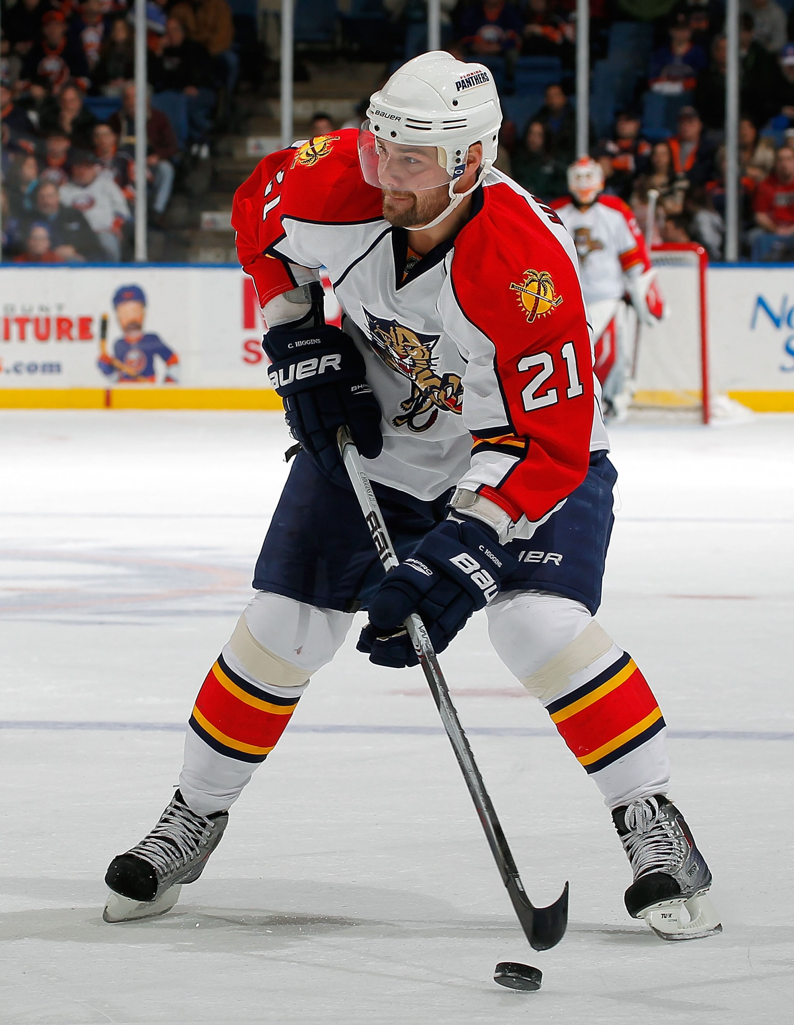 UNIONDALE, NY - FEBRUARY 21:  Chris Higgins #21 of the Florida Panthers skates during an NHL hockey game against the New York Islanders at the Nassau Coliseum on February 21, 2011 in Uniondale, New York.  (Photo by Paul Bereswill/Getty Images)