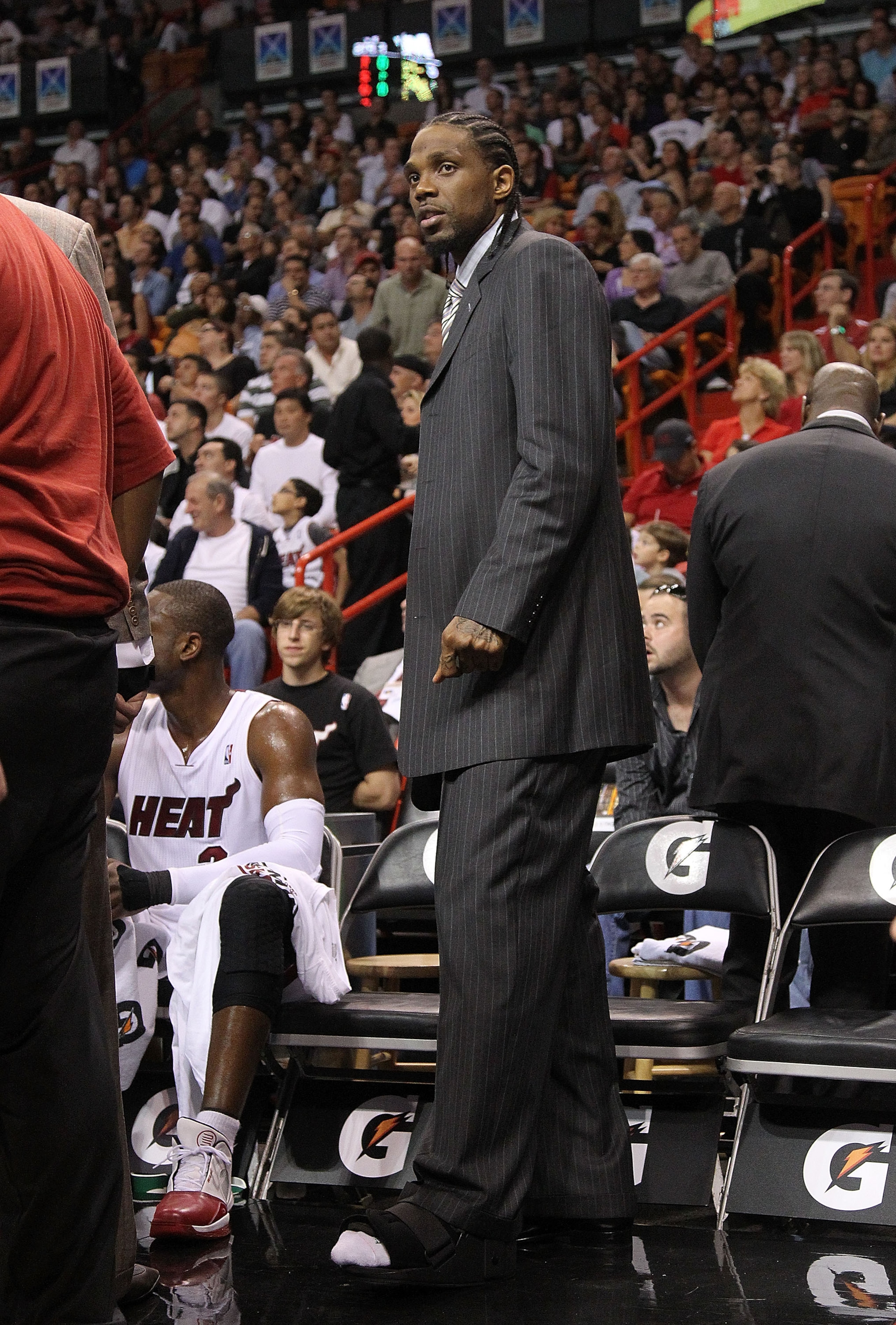 MIAMI - NOVEMBER 22: Udonis Haslem #40 of the Miami Heat waits on the sidlines with an injured foot before having surgery during a game against the Indiana Pacers at American Airlines Arena on November 22, 2010 in Miami, Florida. NOTE TO USER: User expres MIAMI - NOVEMBER 22: Udonis Haslem #40 of the Miami Heat waits on the sidlines with an injured foot before having surgery during a game against the Indiana Pacers at American Airlines Arena on November 22, 2010 in Miami, Florida. NOTE TO USER: User expres