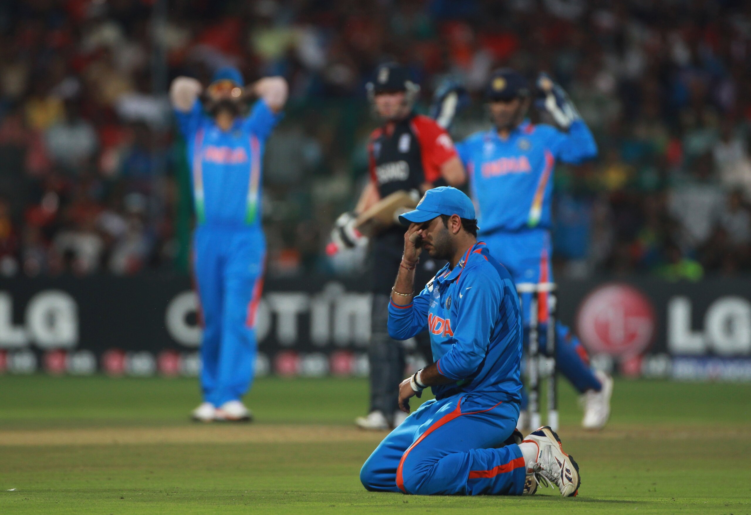 BANGALORE, INDIA - FEBRUARY 27:  Youvraj Singh of India looks on dejected after dropping a chance off Ian Bell of England during the 2011 ICC World Cup Group B match between India and England at M. Chinnaswamy Stadium on February 27, 2011 in Bangalore, In
