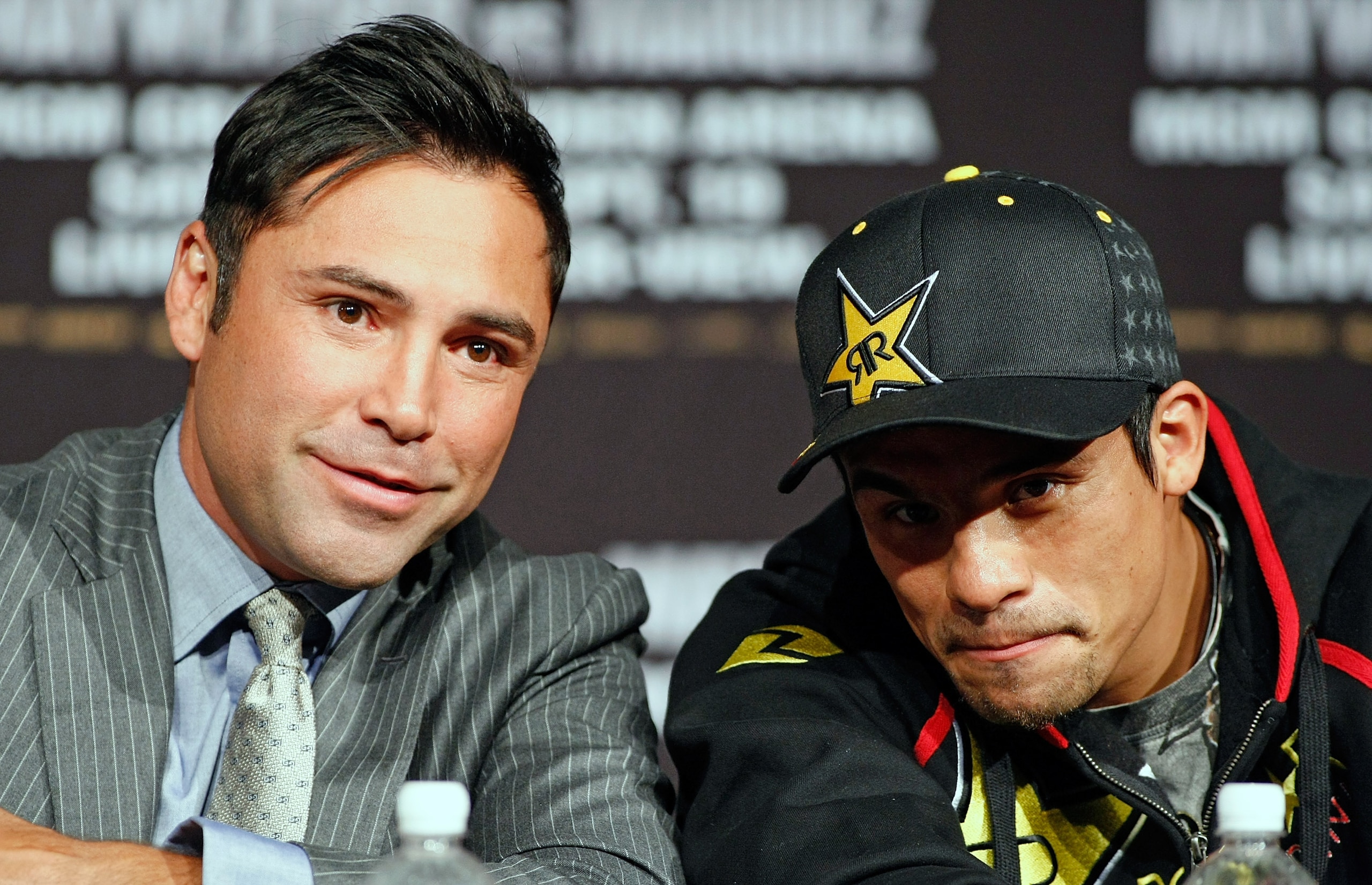 LAS VEGAS - SEPTEMBER 16:  Boxing promoter Oscar De La Hoya (L) and Juan Manuel Marquez appear during the final news conference for Marquez' bout against Floyd Mayweather Jr. at the MGM Grand Hotel/Casino September 16, 2009 in Las Vegas, Nevada. Marquez a