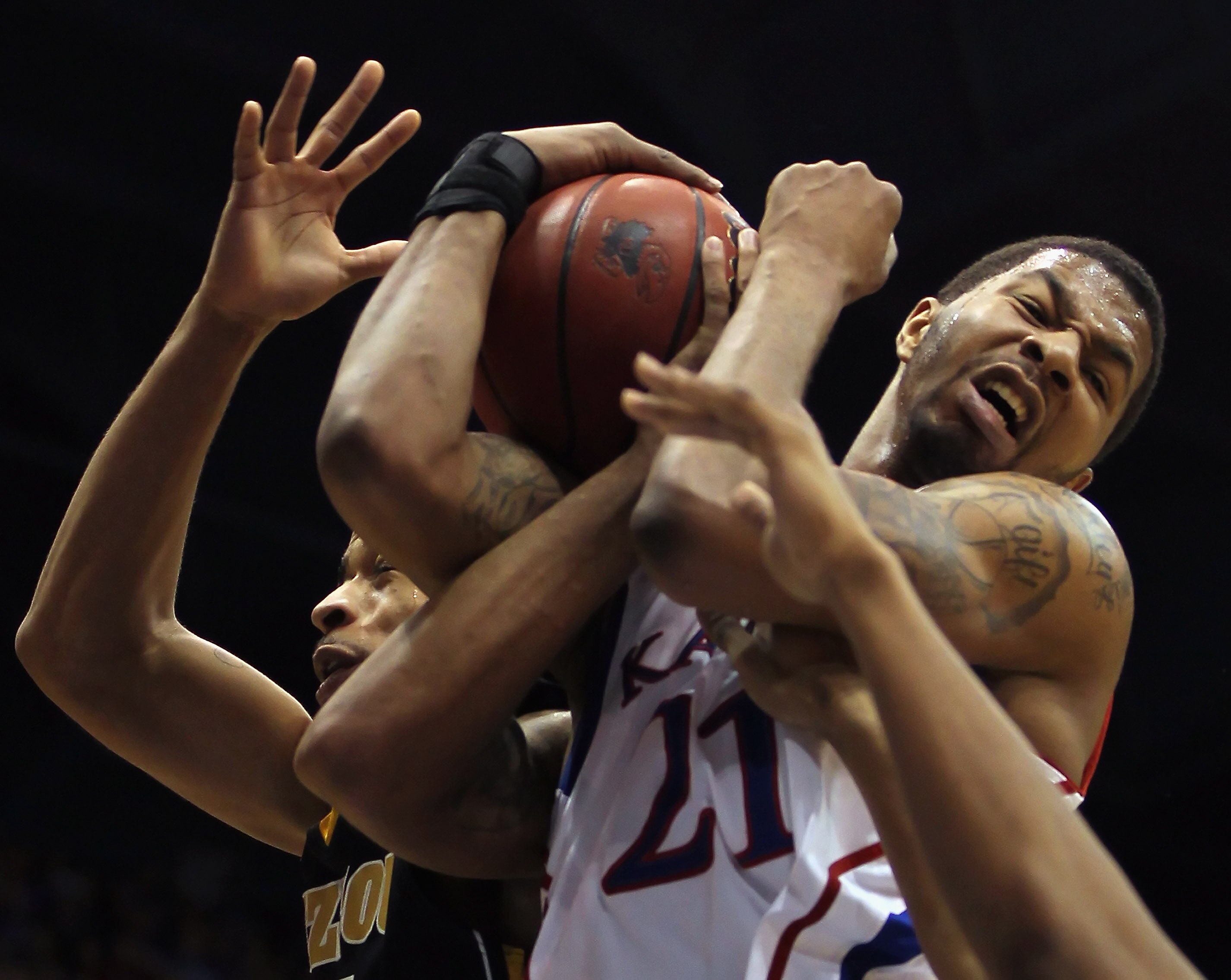 LAWRENCE, KS - FEBRUARY 07:  Markieff Morris #21 of the Kansas Jayhawks shoots as Laurence Bowers #21 of the Missouri Tigers defends during the game on February 5, 2011 at Allen Fieldhouse in Lawrence, Kansas.  (Photo by Jamie Squire/Getty Images)