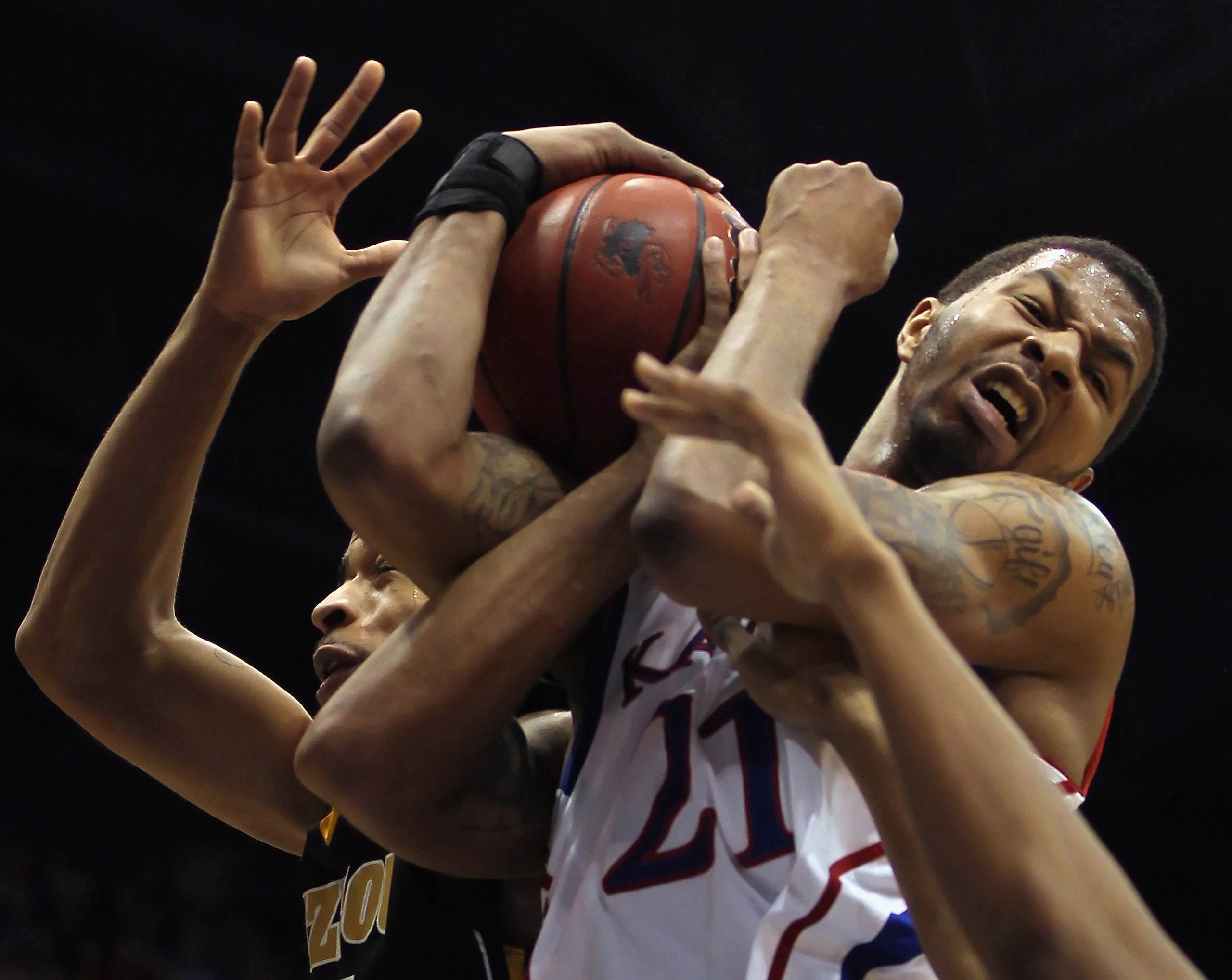 LAWRENCE, KS - FEBRUARY 07:  Markieff Morris #21 of the Kansas Jayhawks shoots as Laurence Bowers #21 of the Missouri Tigers defends during the game on February 5, 2011 at Allen Fieldhouse in Lawrence, Kansas.  (Photo by Jamie Squire/Getty Images)