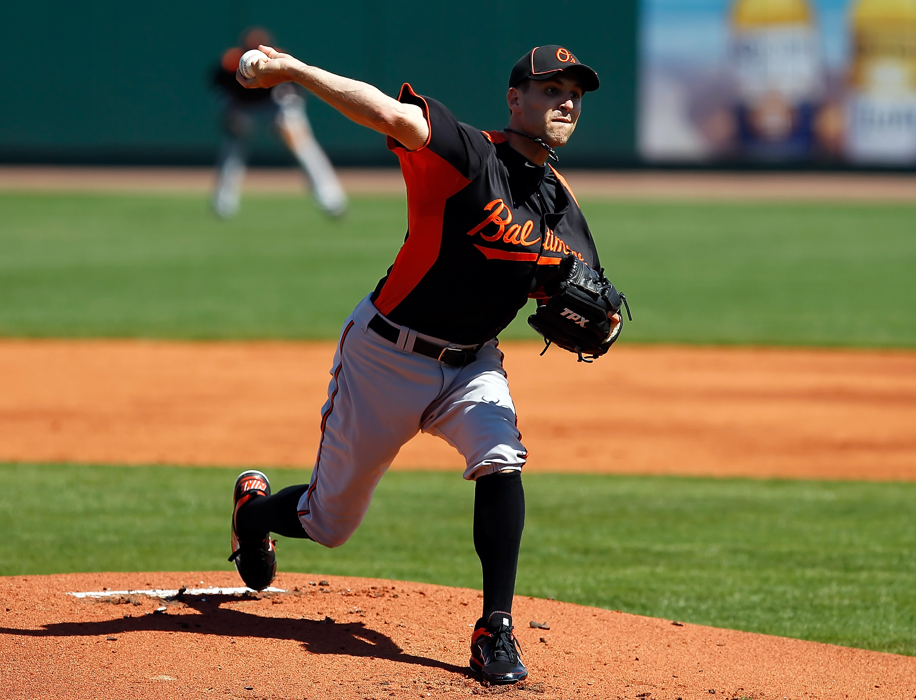 BRADENTON, FL - FEBRUARY 28:  Pitcher Brad Bergesen #35 of the Baltimore Orioles pitches against the Pittsburgh Pirates during a Grapefruit League Spring Training Game at McKechnie Field on February 28, 2011 in Bradenton, Florida.  (Photo by J. Meric/Gett