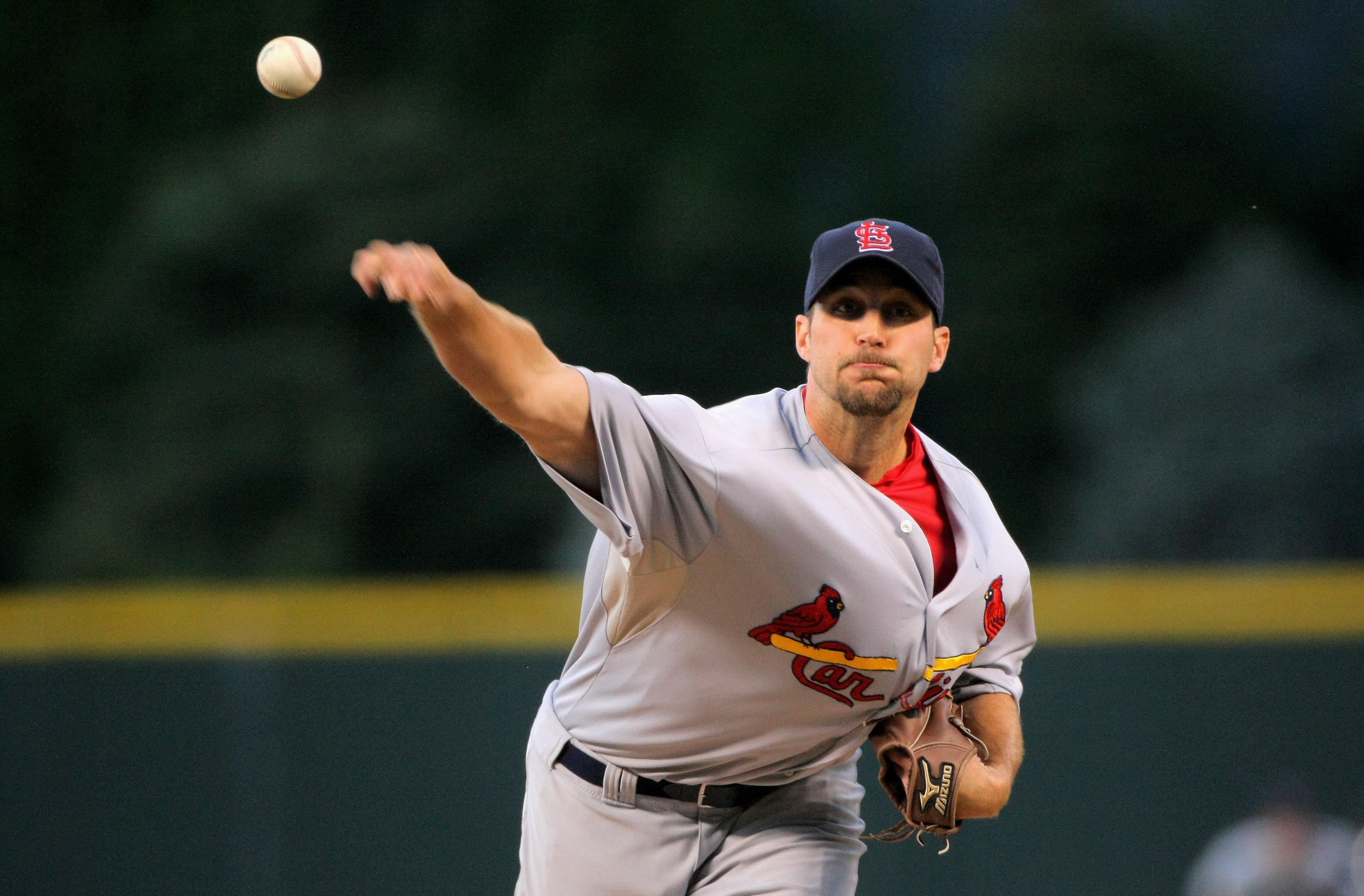 DENVER - SEPTEMBER 26: Starting pitcher Adam Wainright #50 of the St. Louis Cardinals delivers against the Colorado Rockies at Coors Field on September 26, 2009 in Denver, Colorado. Wainright earned the win as the Cardinals clinched the National League C
