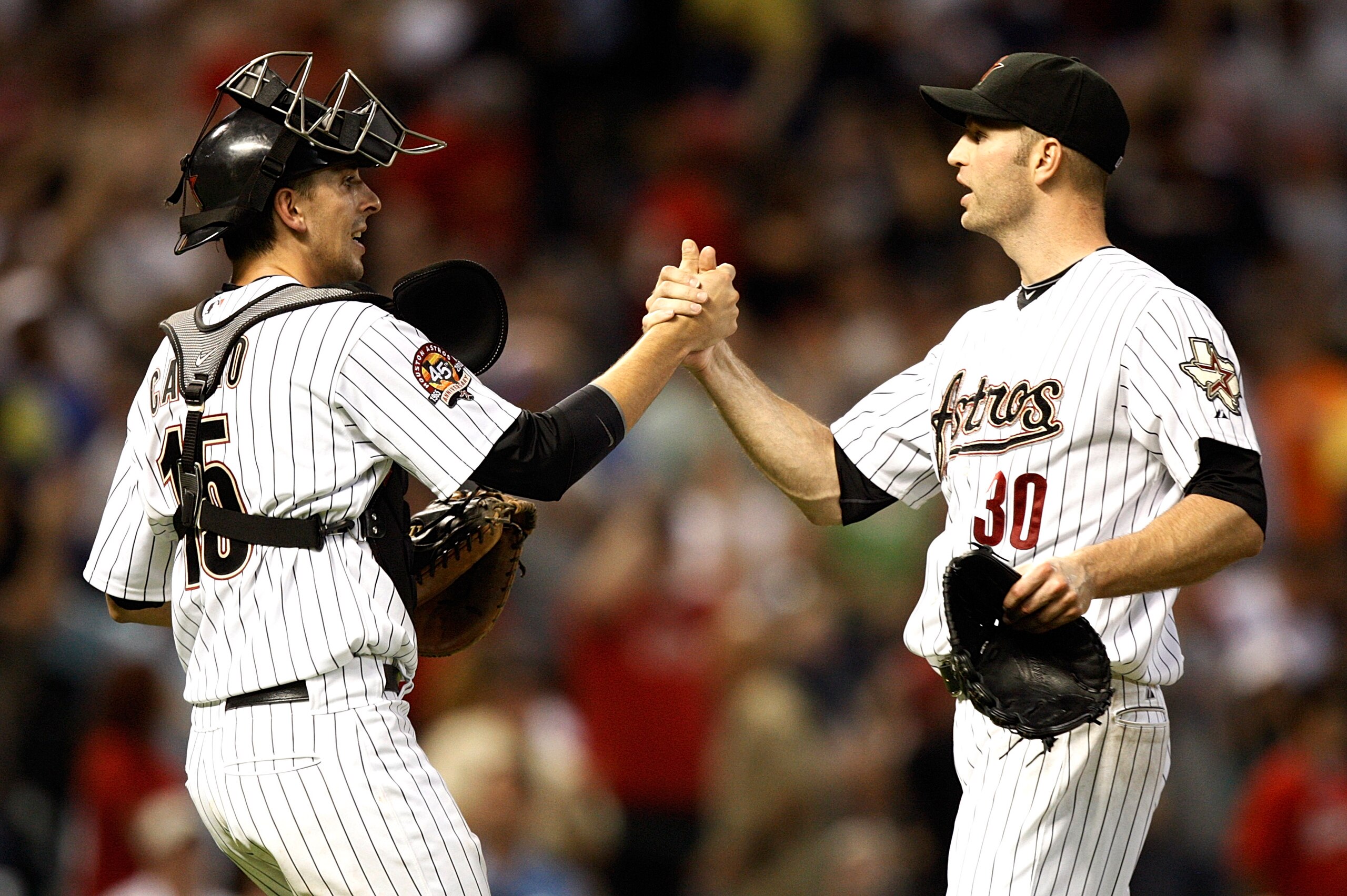 HOUSTON - AUGUST 30:  Catcher Jason Castros #15 and pitcher J.A. Happ #30 of the Houston Astros shake hands after the final out against the St. Louis Cardinals at Minute Maid Park on August 30, 2010 in Houston, Texas. The Astros beat the Cardinals 3-0.  (