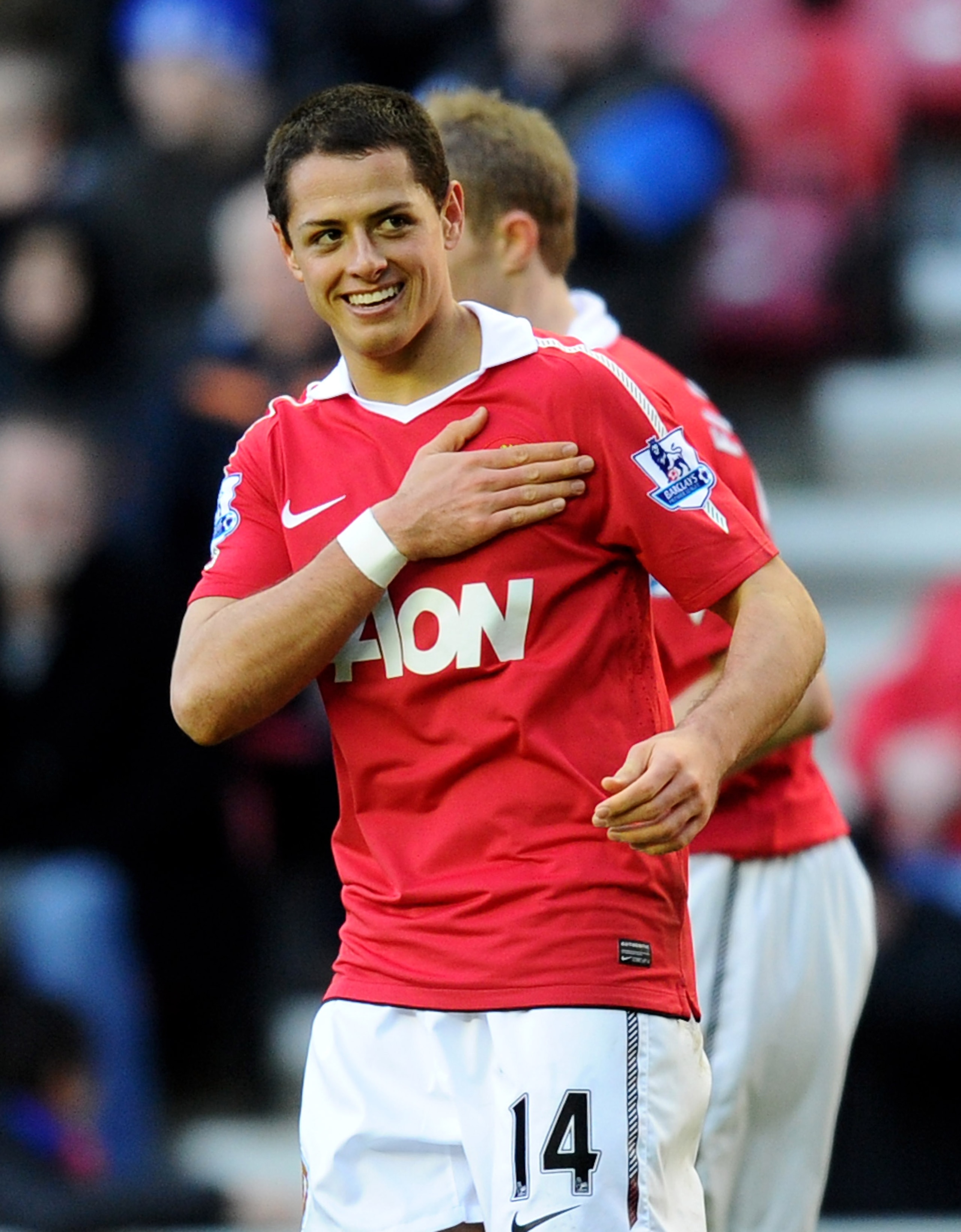 WIGAN, ENGLAND - FEBRUARY 26: Chicharito of Manchester United celebrates scoring his team's second goal during the Barclays Premier League match between Wigan Athletic and Manchester United at the DW Stadium on February 26, 2011 in Wigan, England. (Phot WIGAN, ENGLAND - FEBRUARY 26: Chicharito of Manchester United celebrates scoring his team's second goal during the Barclays Premier League match between Wigan Athletic and Manchester United at the DW Stadium on February 26, 2011 in Wigan, England. (Phot
