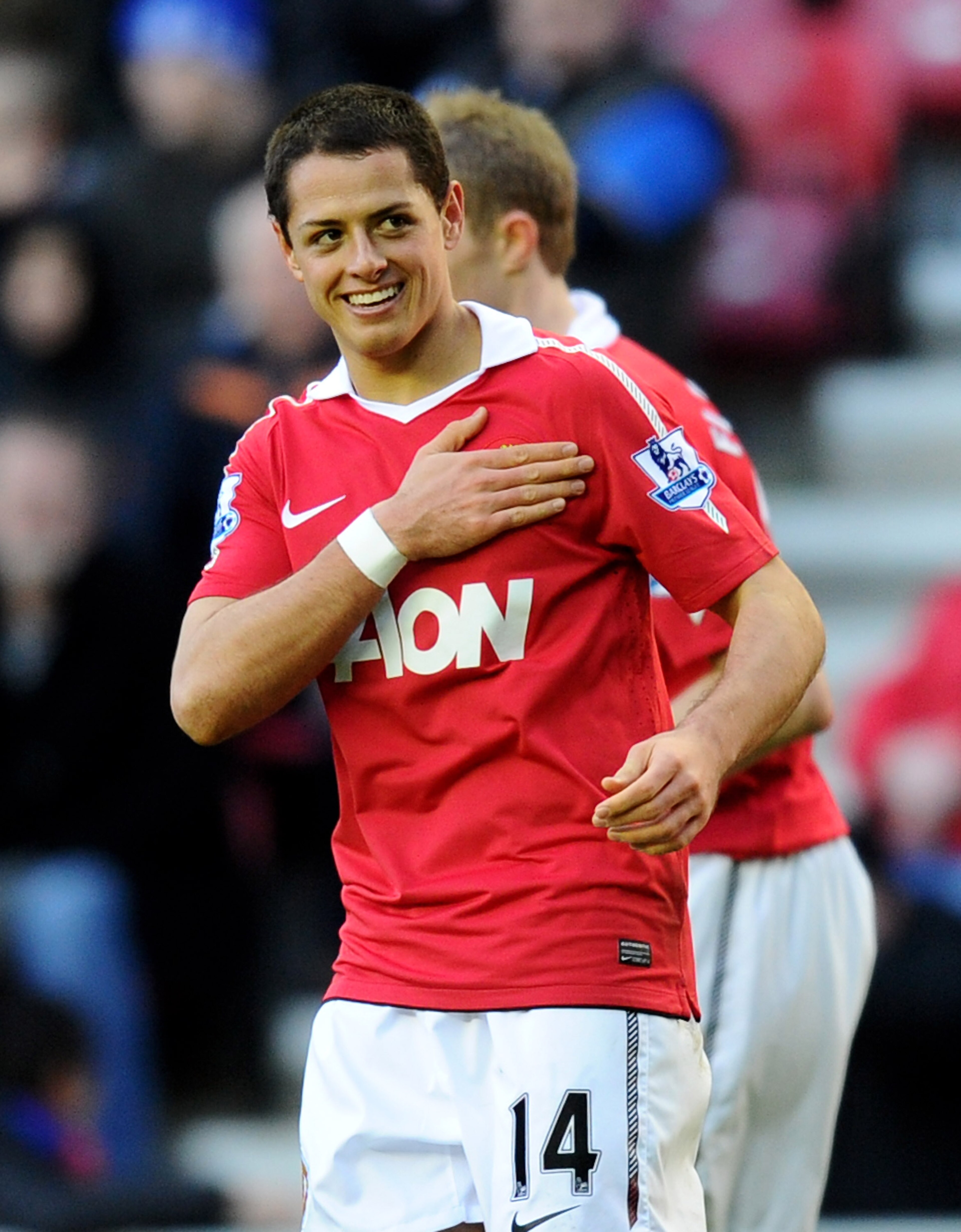 WIGAN, ENGLAND - FEBRUARY 26:  Chicharito of Manchester United celebrates scoring his team's second goal during the Barclays Premier League match between Wigan Athletic and Manchester United at the DW Stadium on February 26, 2011 in Wigan, England.  (Phot