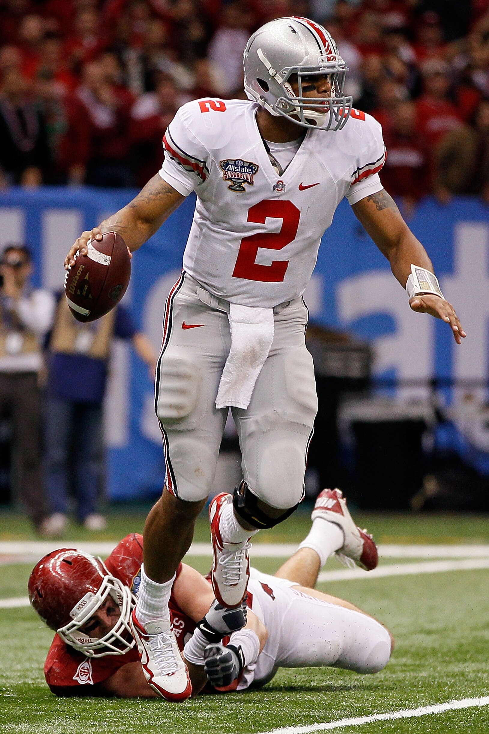 NEW ORLEANS, LA - JANUARY 04:  Quarterback Terrelle Pryor #2 of the Ohio State Buckeyes looks to run against the Arkansas Razorbacks during the Allstate Sugar Bowl at the Louisiana Superdome on January 4, 2011 in New Orleans, Louisiana.  (Photo by Kevin C
