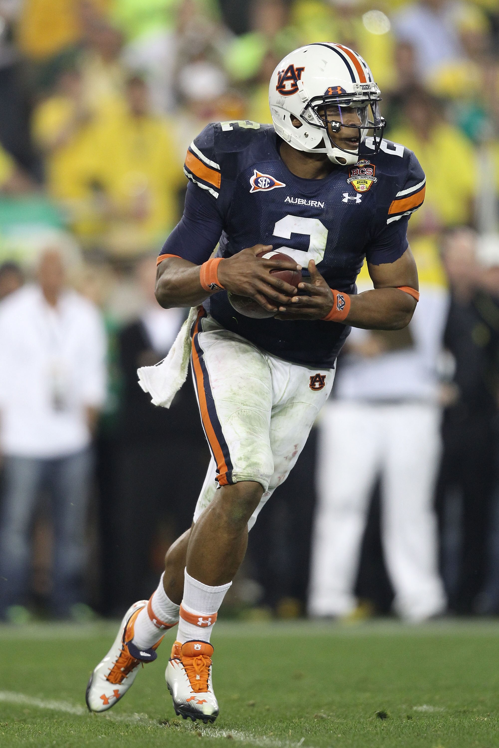 GLENDALE, AZ - JANUARY 10:  Cameron Newton #2 of the Auburn Tigers scrambles against the Oregon Ducks during the Tostitos BCS National Championship Game at University of Phoenix Stadium on January 10, 2011 in Glendale, Arizona.  (Photo by Christian Peters