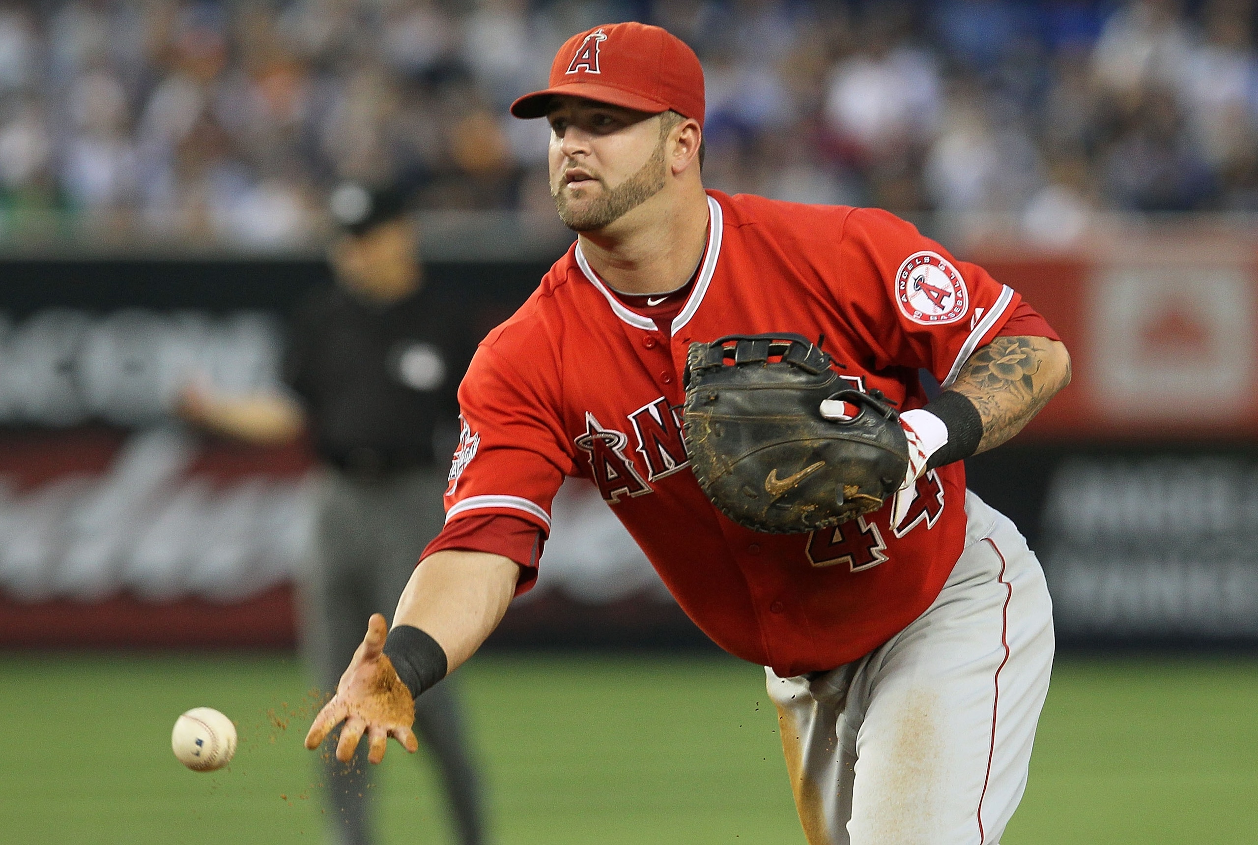NEW YORK - JULY 20: Mike Napoli #44 of the Los Angeles Angels of Anaheim flips the ball to first base for an out against the New York Yankees on July 20, 2010 at Yankee Stadium in the Bronx borough of New York City. (Photo by Jim McIsaac/Getty Images) NEW YORK - JULY 20: Mike Napoli #44 of the Los Angeles Angels of Anaheim flips the ball to first base for an out against the New York Yankees on July 20, 2010 at Yankee Stadium in the Bronx borough of New York City. (Photo by Jim McIsaac/Getty Images)