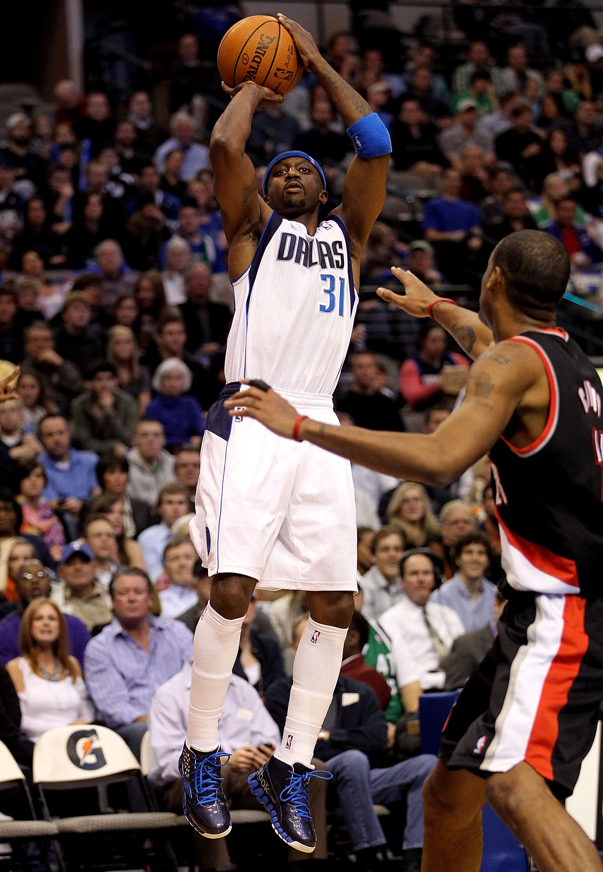 DALLAS, TX - JANUARY 04:  Guard Jason Terry #31 of the Dallas Mavericks takes a shot against Marcus Camby #23 of the Portland Trail Blazers at American Airlines Center on January 4, 2011 in Dallas, Texas.  NOTE TO USER: User expressly acknowledges and agr