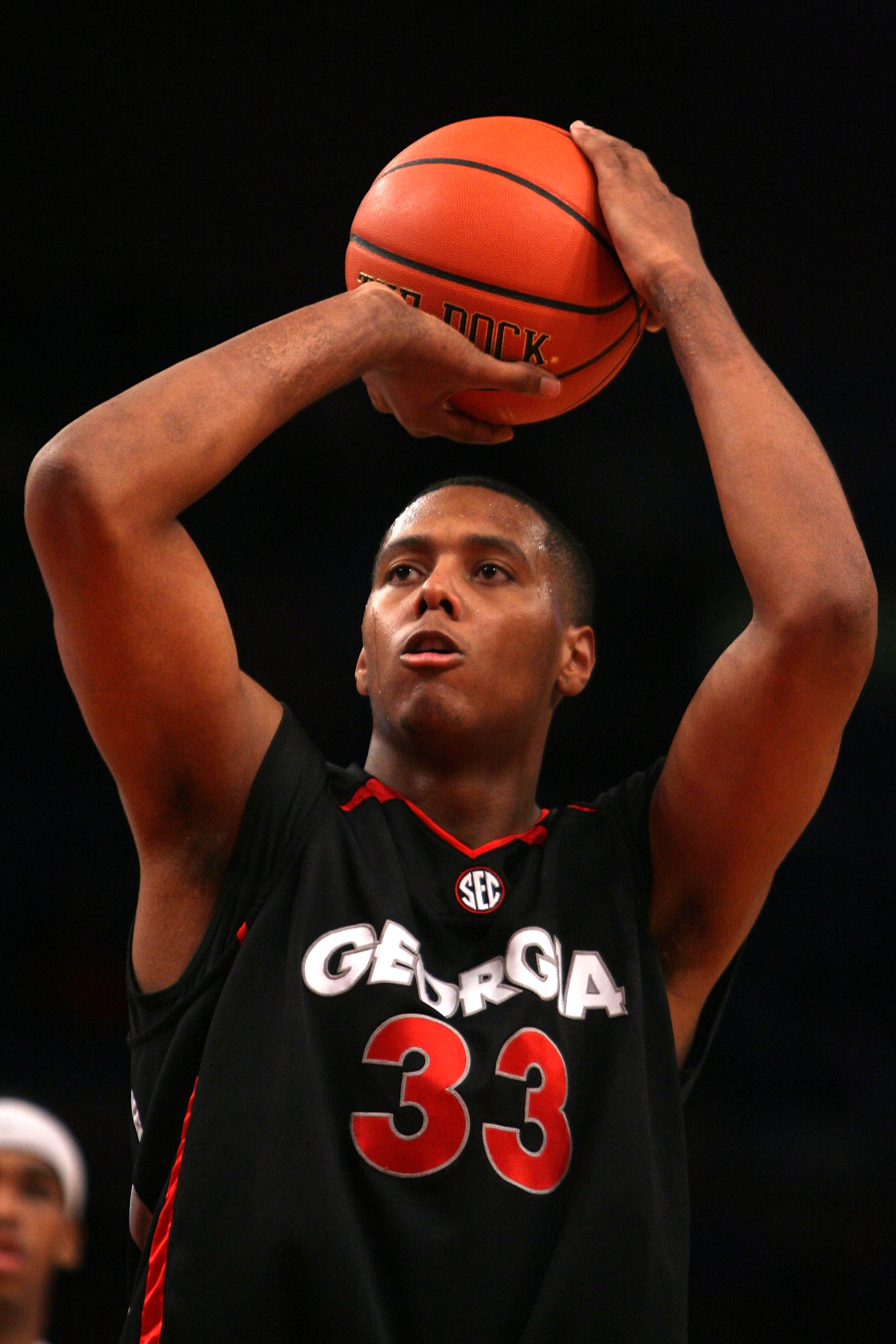 NEW YORK - DECEMBER 09: Trey Thompkins #33 of the Georgia Bulldogs shoots a free throw against the St. John's Red Storm during the SEC Big East Invitational at Madison Square Garden on December 9, 2009 in New York, New York. The Red Storm defeated the Bul