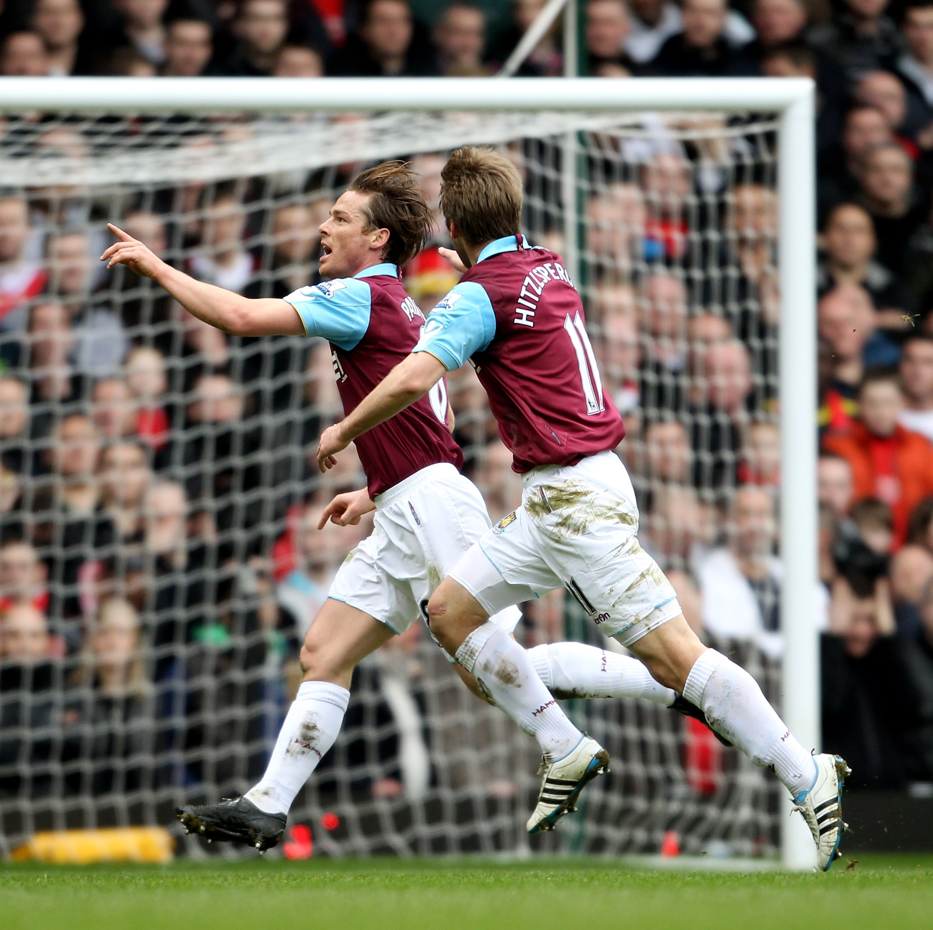 LONDON, ENGLAND - FEBRUARY 27:  Scott Parker (L) of West Ham celebrates with teammate Thomas Hitzlsperger as he scores the opening goal during the Barclays Premier League match between West Ham United and Liverpool at the Boleyn Ground on February 27, 201