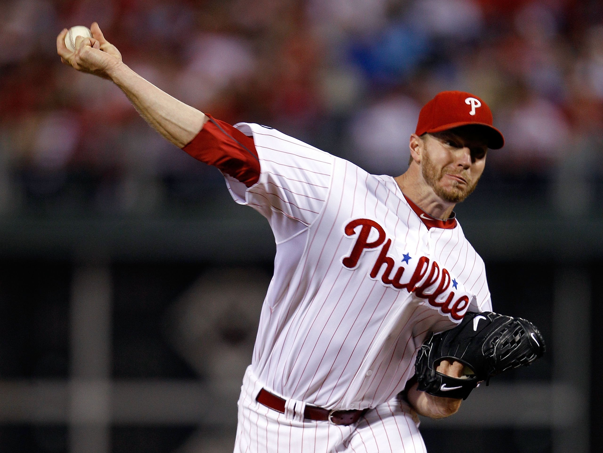 PHILADELPHIA - OCTOBER 16:  Roy Halladay #34 of the Philadelphia Phillies pitches in the first inning against the San Francisco Giants in Game One of the NLCS during the 2010 MLB Playoffs at Citizens Bank Park on October 16, 2010 in Philadelphia, Pennsylv