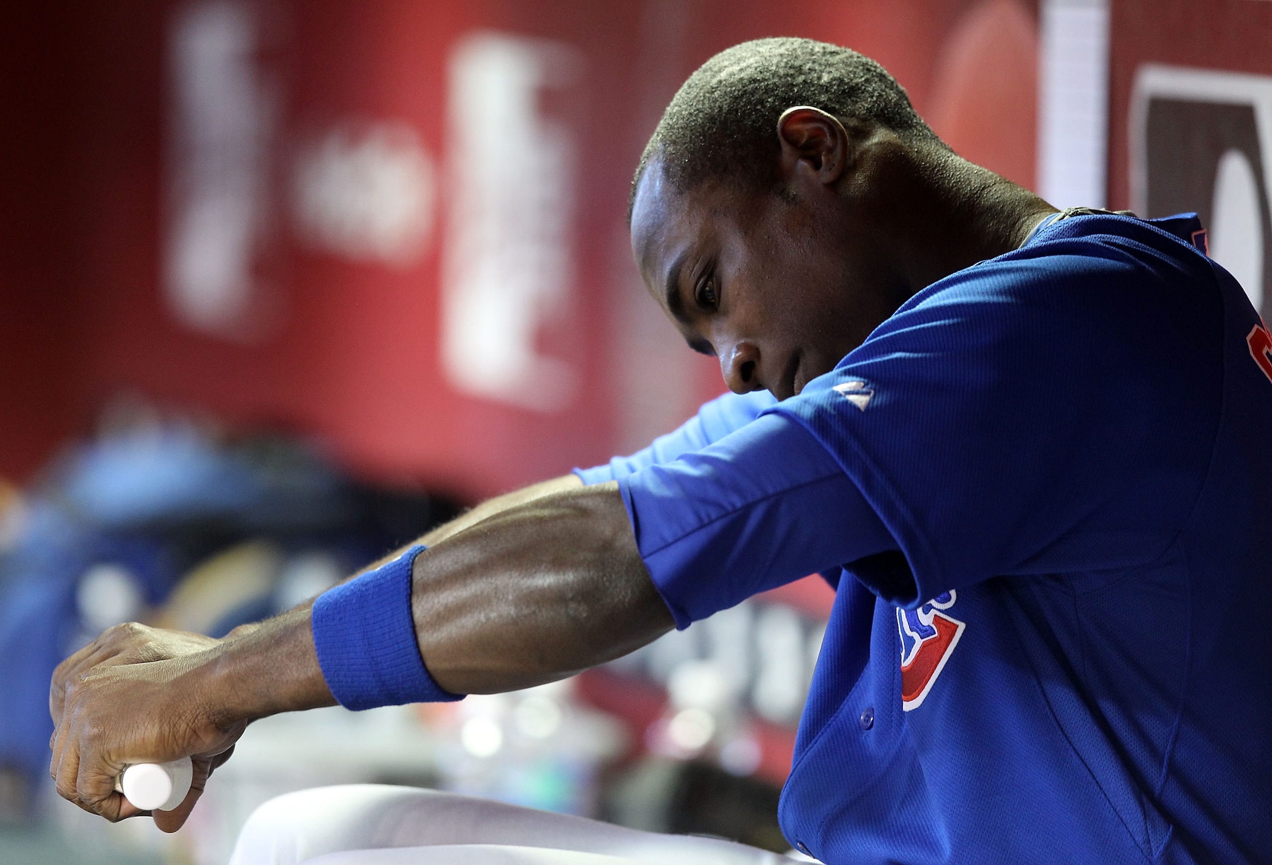 PHOENIX - JULY 05:  Alfonso Soriano #12 of the Chicago Cubs sits in the dugout during the Major League Baseball game against the Arizona Diamondbacks at Chase Field on July 5, 2010 in Phoenix, Arizona. The Cubs defeated the Diamondbacks 9-4.  (Photo by Ch