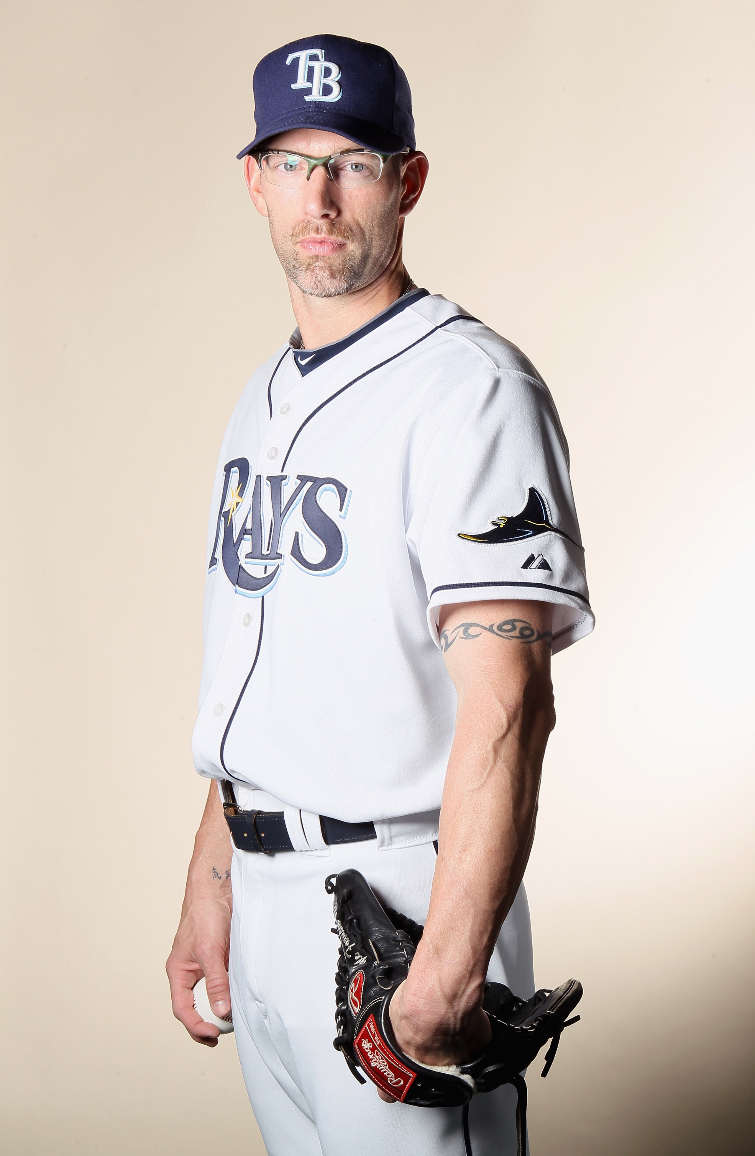 FT. MYERS, FL - FEBRUARY 22: Kyle Farnsworth #43 of the Tampa Bay Rays poses for a portrait during the Tampa Bay Rays Photo Day on February 22, 2011 at the Charlotte Sports Complex in Port Charlotte, Florida. (Photo by Elsa/Getty Images) FT. MYERS, FL - FEBRUARY 22: Kyle Farnsworth #43 of the Tampa Bay Rays poses for a portrait during the Tampa Bay Rays Photo Day on February 22, 2011 at the Charlotte Sports Complex in Port Charlotte, Florida. (Photo by Elsa/Getty Images)