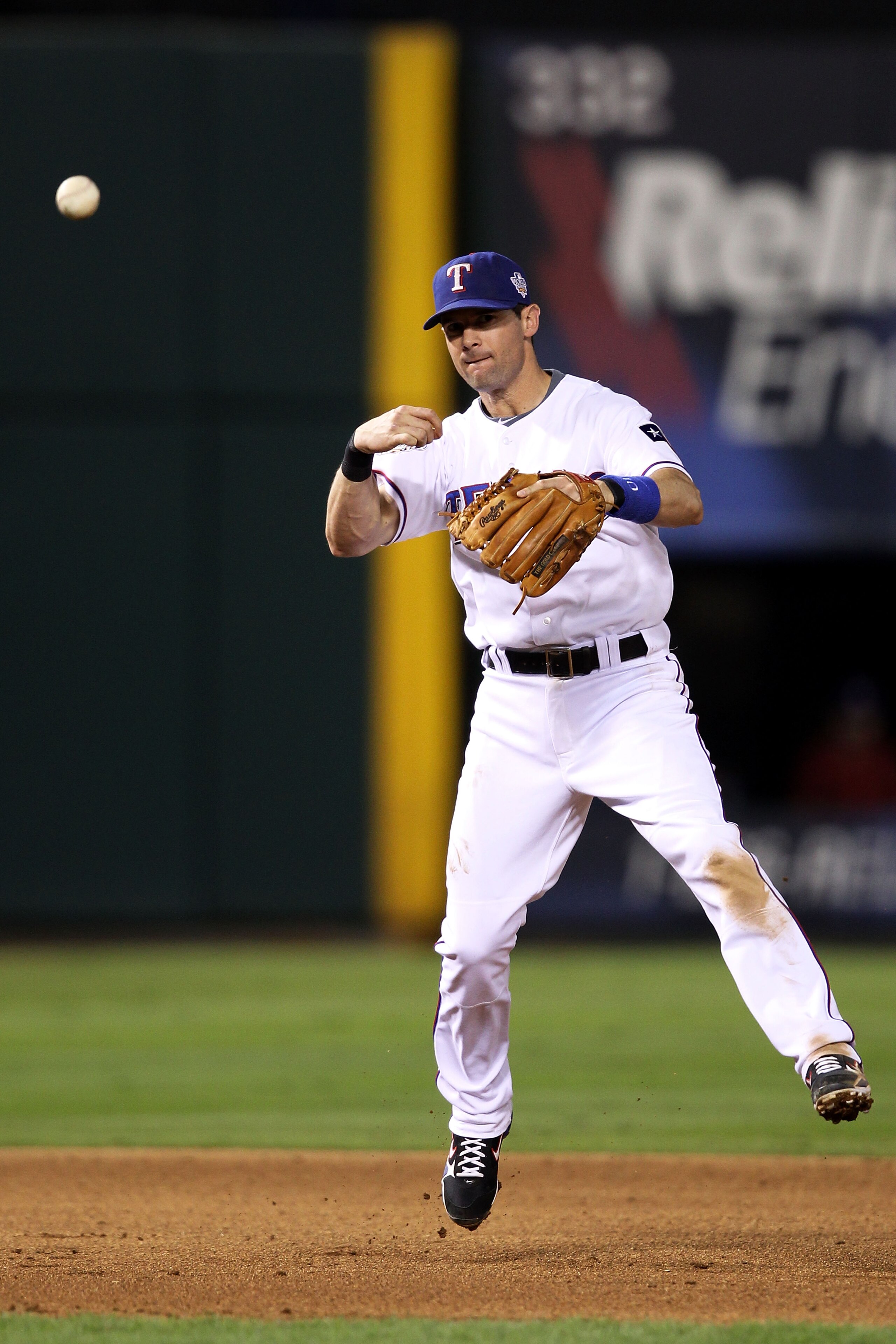 ARLINGTON, TX - OCTOBER 31:  Michael Young #10 of the Texas Rangers throws to first for the out against the San Francisco Giants in Game Four of the 2010 MLB World Series at Rangers Ballpark in Arlington on October 31, 2010 in Arlington, Texas.  (Photo by