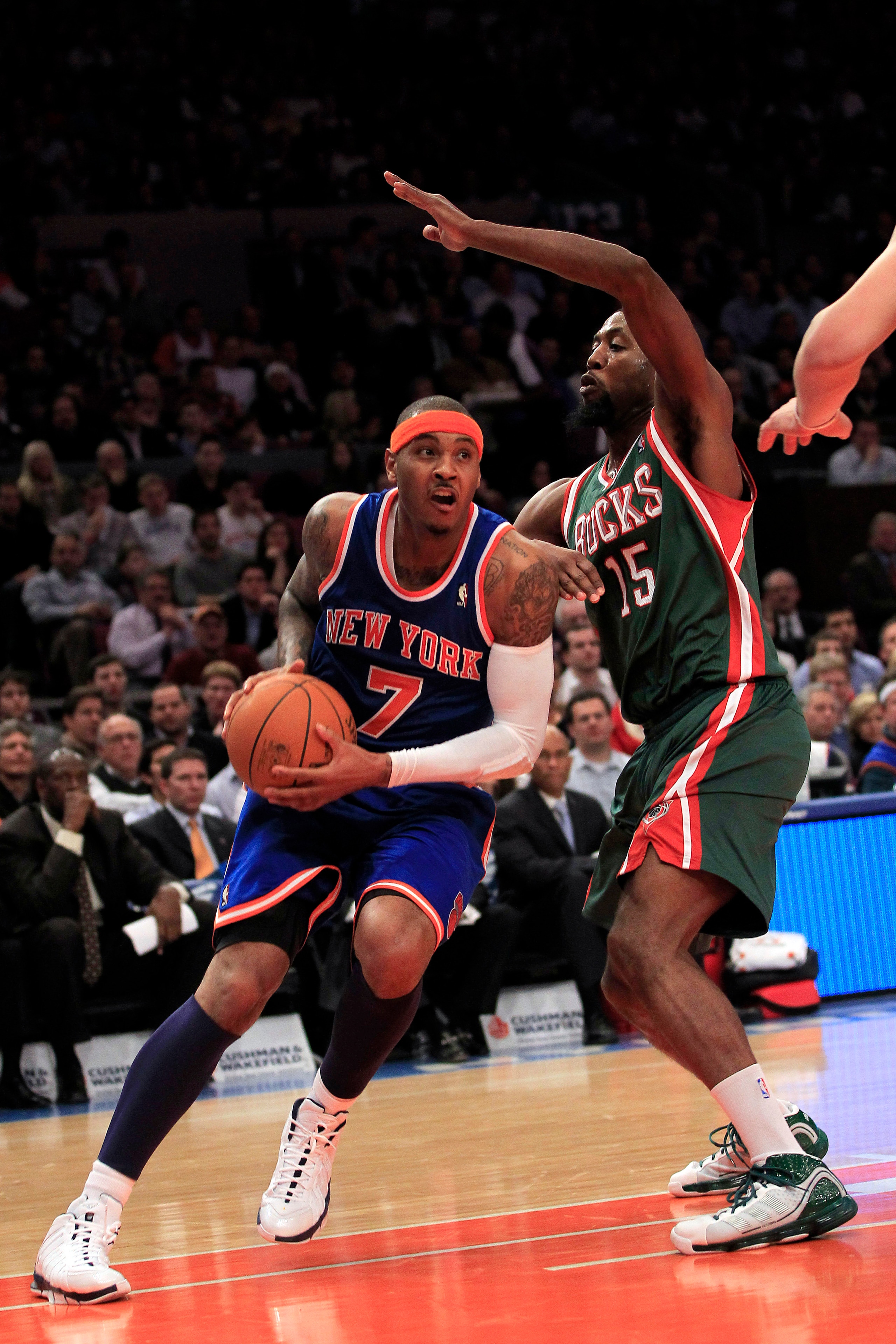 NEW YORK, NY - FEBRUARY 23:  Carmelo Anthony #7 of the New York Knicks goes up for a basket against John Salmons #15 of the Milwaukee Bucks at Madison Square Garden on February 23, 2011 in New York City. NOTE TO USER: User expressly acknowledges and agree