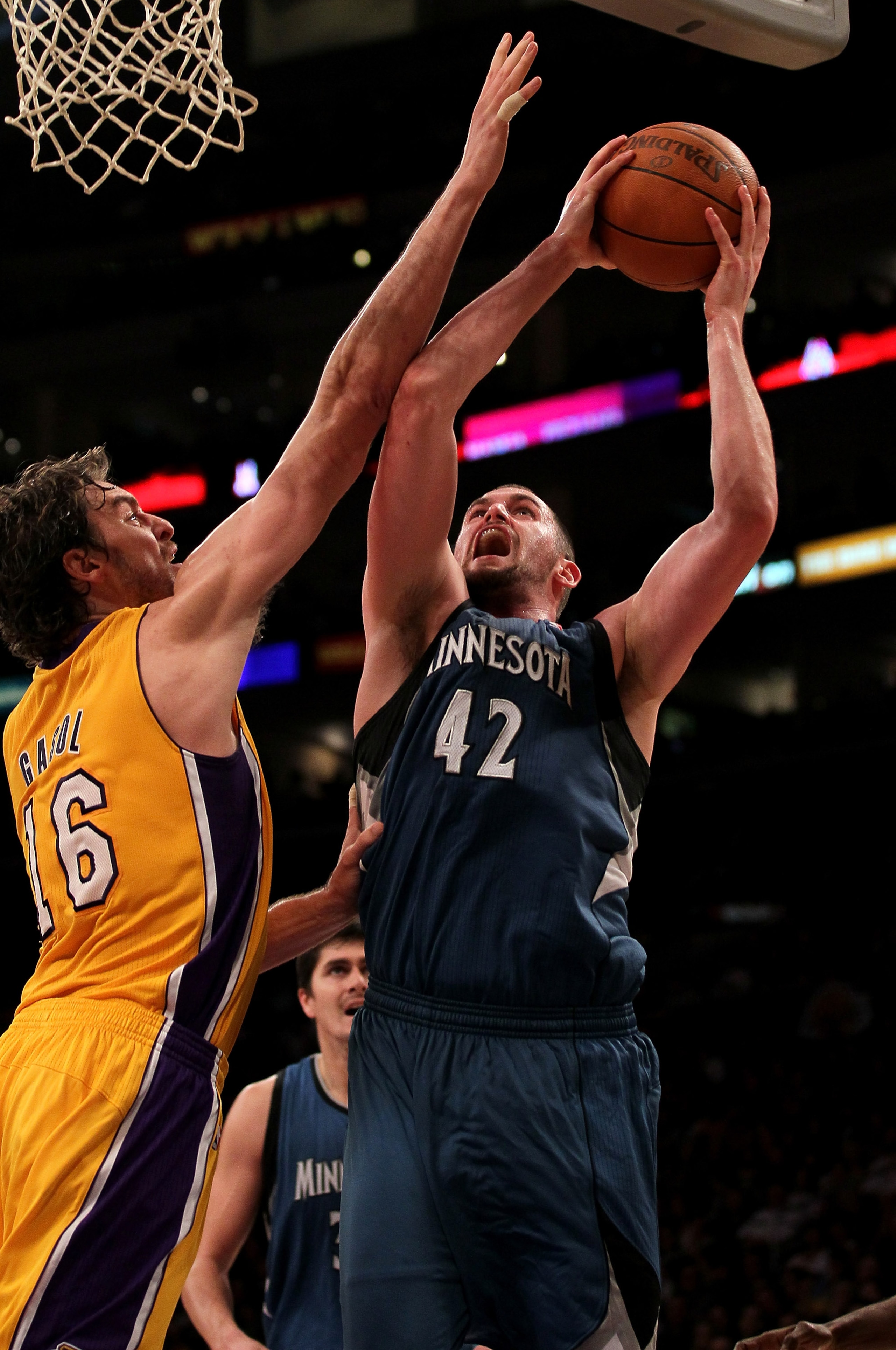 LOS ANGELES - NOVEMBER 9: Kevin Love #42 of the Minnesota Timberwolves shoots over Pau Gasol #16 of the Los Angeles Lakers at Staples Center on November 9, 2010 in Los Angeles, California. The Lakers won 99-94. NOTE TO USER: User expressly acknowledges LOS ANGELES - NOVEMBER 9: Kevin Love #42 of the Minnesota Timberwolves shoots over Pau Gasol #16 of the Los Angeles Lakers at Staples Center on November 9, 2010 in Los Angeles, California. The Lakers won 99-94. NOTE TO USER: User expressly acknowledges
