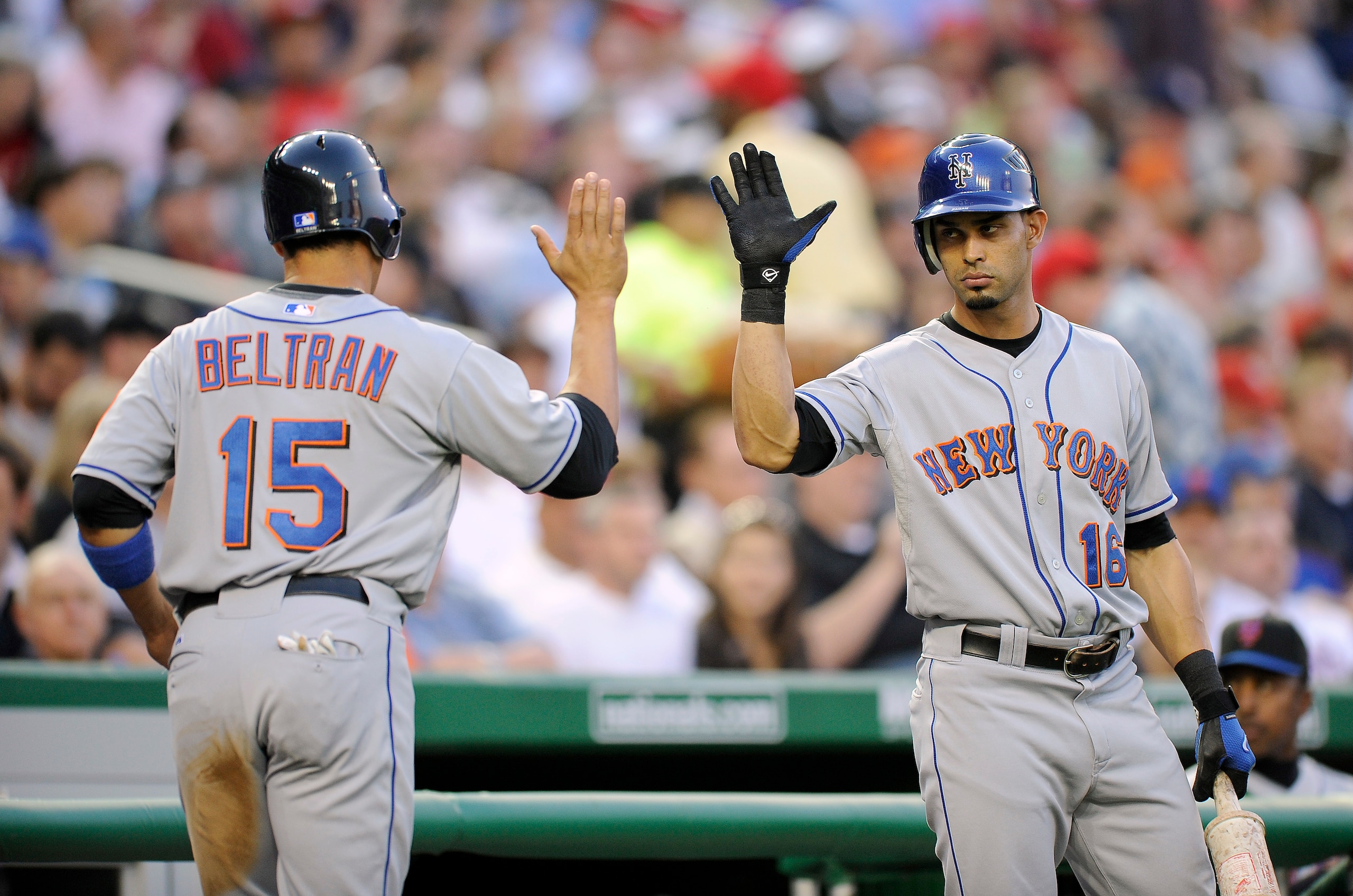 WASHINGTON - APRIL 23:  Carlos Beltran #15 of the New York Mets is congratulated by Angel Pagan #16 after scoring against the Washington Nationals April 23, 2008 at Nationals Park in Washington, DC.  (Photo by Greg Fiume/Getty Images)