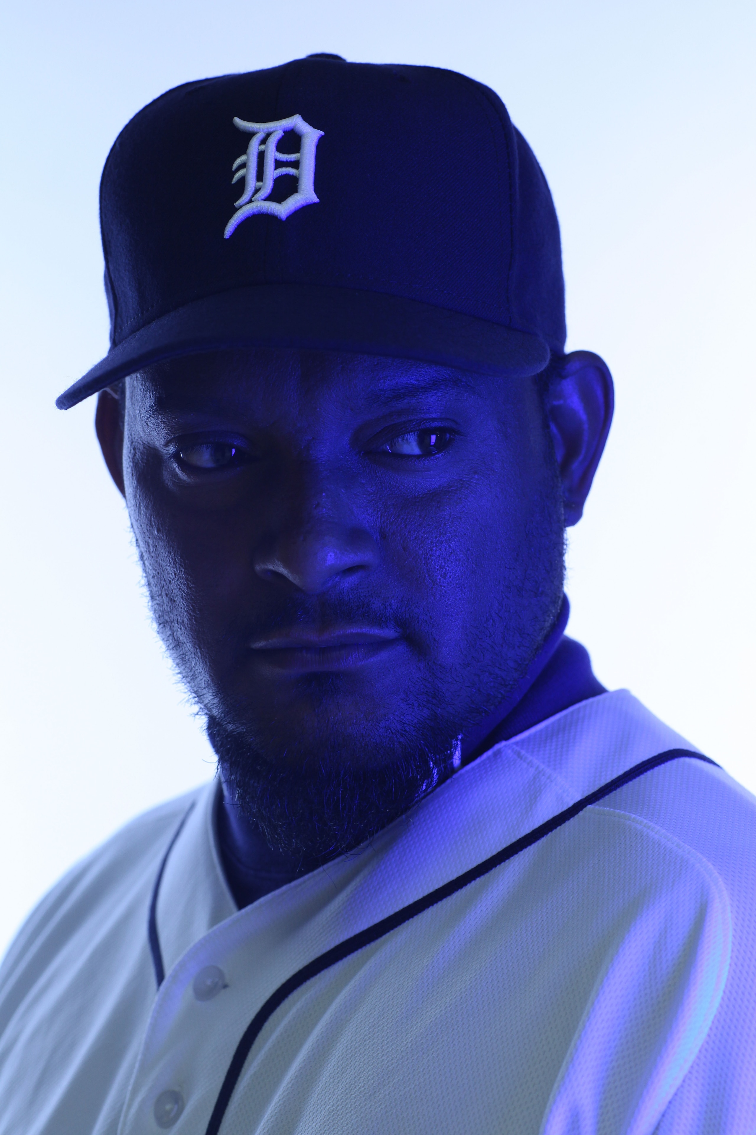 LAKELAND, FL - FEBRUARY 21:  (EDITORS NOTE: Image was shot with a colored gel on lights) Jose Valverde #46 of the Detroit Tigers poses for a portrait during Photo Day on February 21, 2011 at Joker Marchant Stadium in Lakeland, Florida.  (Photo by Nick Lah