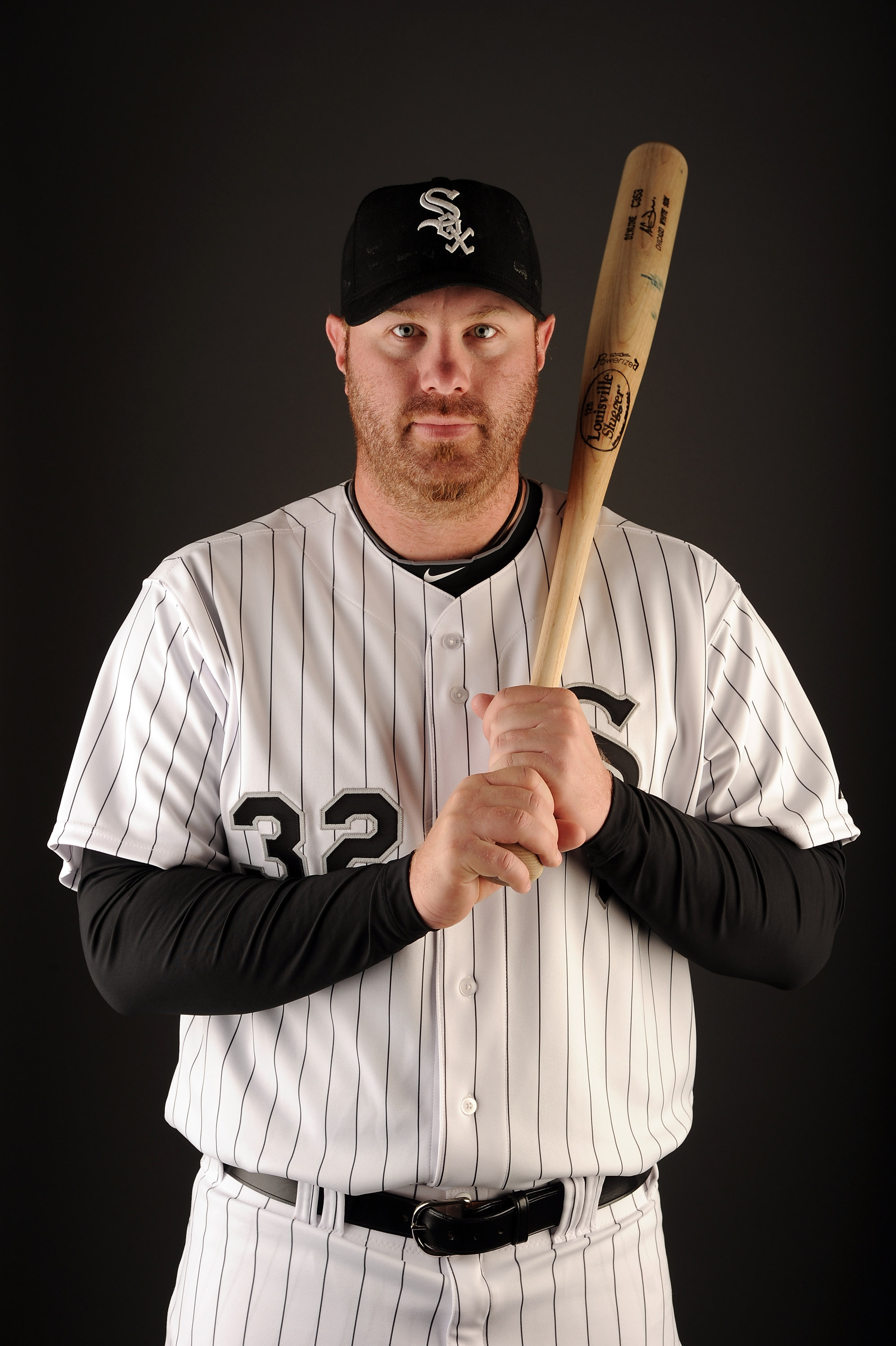 Washington Nationals baseball player Adam Dunn poses with his wife