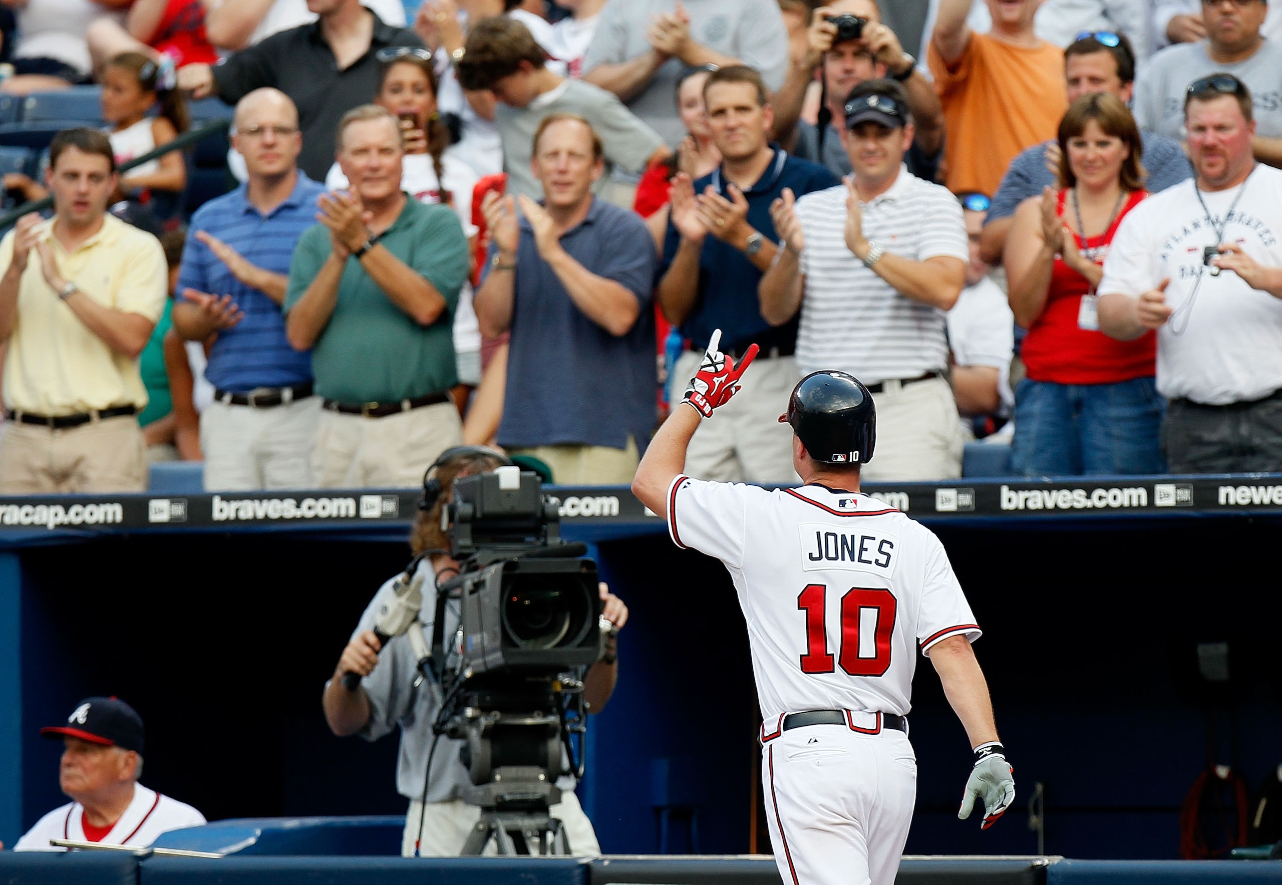 ATLANTA - JULY 15:  Chipper Jones #10 of the Atlanta Braves reacts after hitting a solo homer in the third inning against the Milwaukee Brewers at Turner Field on July 15, 2010 in Atlanta, Georgia.  (Photo by Kevin C. Cox/Getty Images)