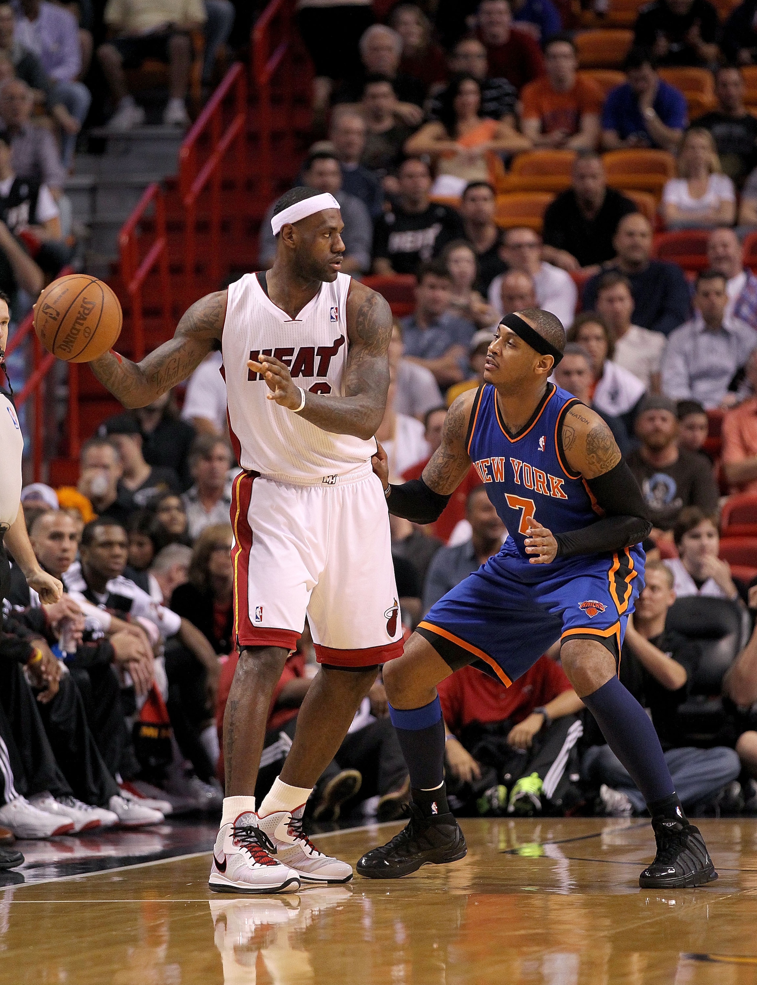 MIAMI, FL - FEBRUARY 27:  LeBron James #6 of the Miami Heat is guarded by Carmelo Anthony #7 of the New York Knicks during a game at American Airlines Arena on February 27, 2011 in Miami, Florida. NOTE TO USER: User expressly acknowledges and agrees that,