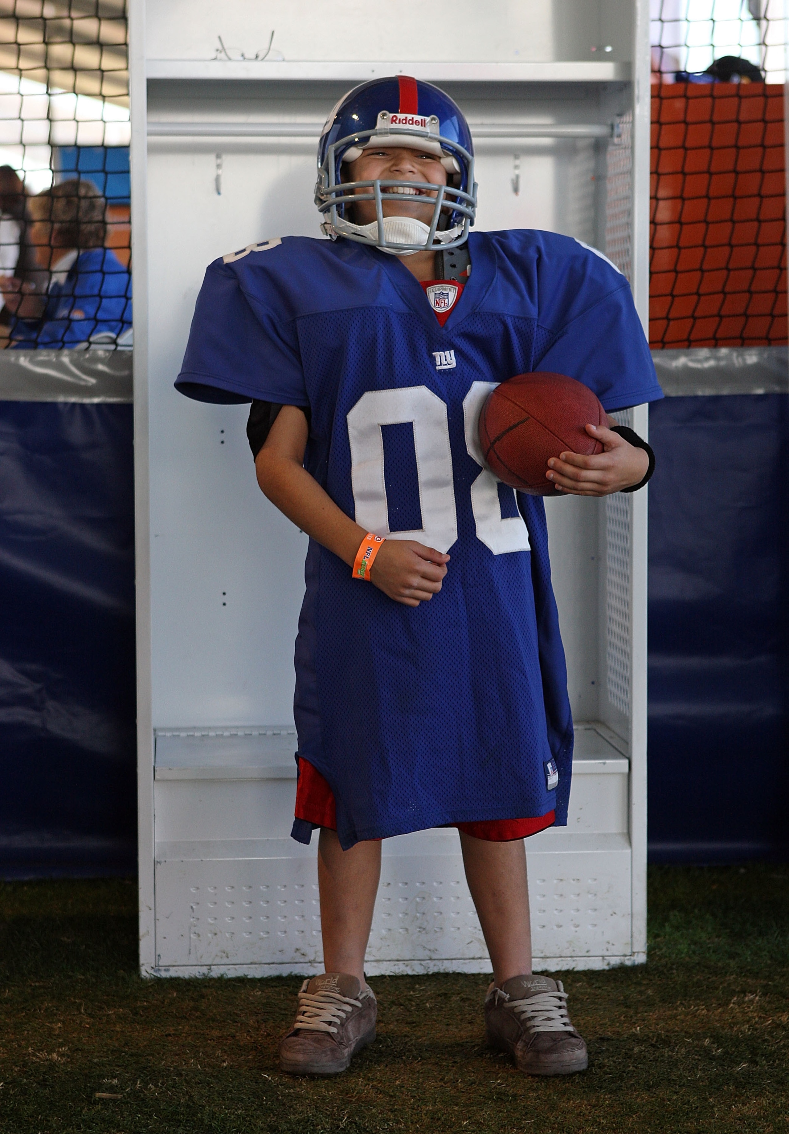 GLENDALE, AZ - FEBRUARY 01:  Marcel Perez of Glendale, Arizona wears a New York Giants uniform at the NFL Experience at University of Phoenix Stadium on February 1, 2007  in Glendale, Arizona  (Photo by Andy Lyons/Getty Images)
