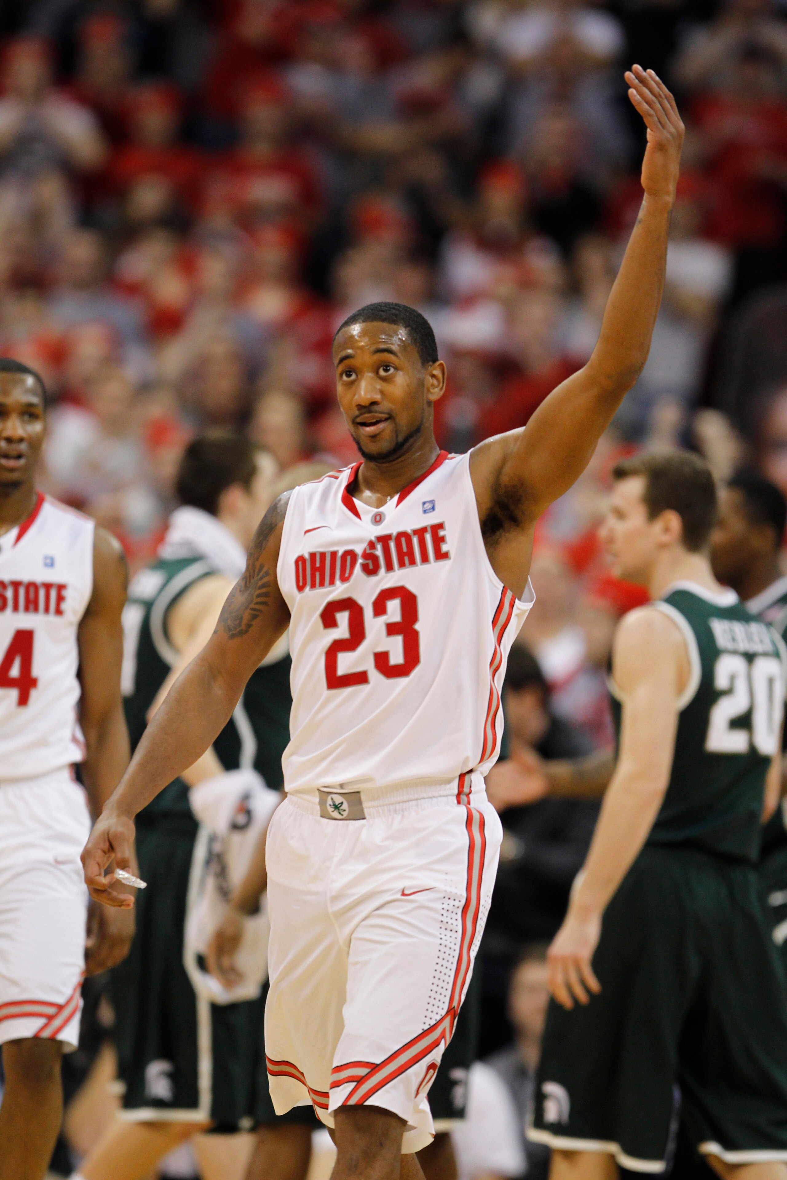 COLUMBUS, OH - FEBRUARY 15:  David Lighty #23 of the Ohio State Buckeyes reacts while playing the Michigan State Spartans on February 15, 2011 at Value City Arena in Columbus, Ohio.  (Photo by Gregory Shamus/Getty Images)