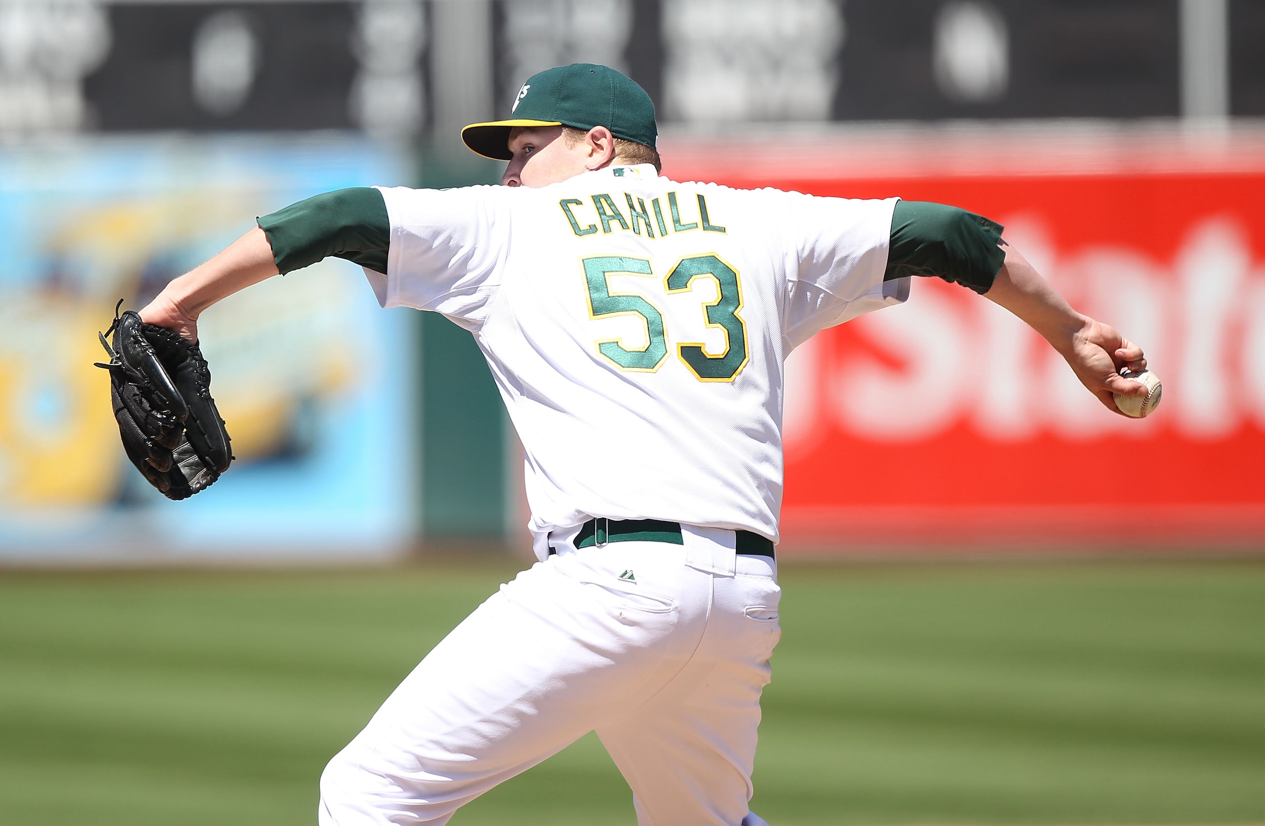 OAKLAND, CA - AUGUST 08:  Trevor Cahill #53 of the Oakland Athletics pitches against the Texas Rangers during an MLB game at the Oakland-Alameda County Coliseum on August 8, 2010 in Oakland, California.  (Photo by Jed Jacobsohn/Getty Images)
