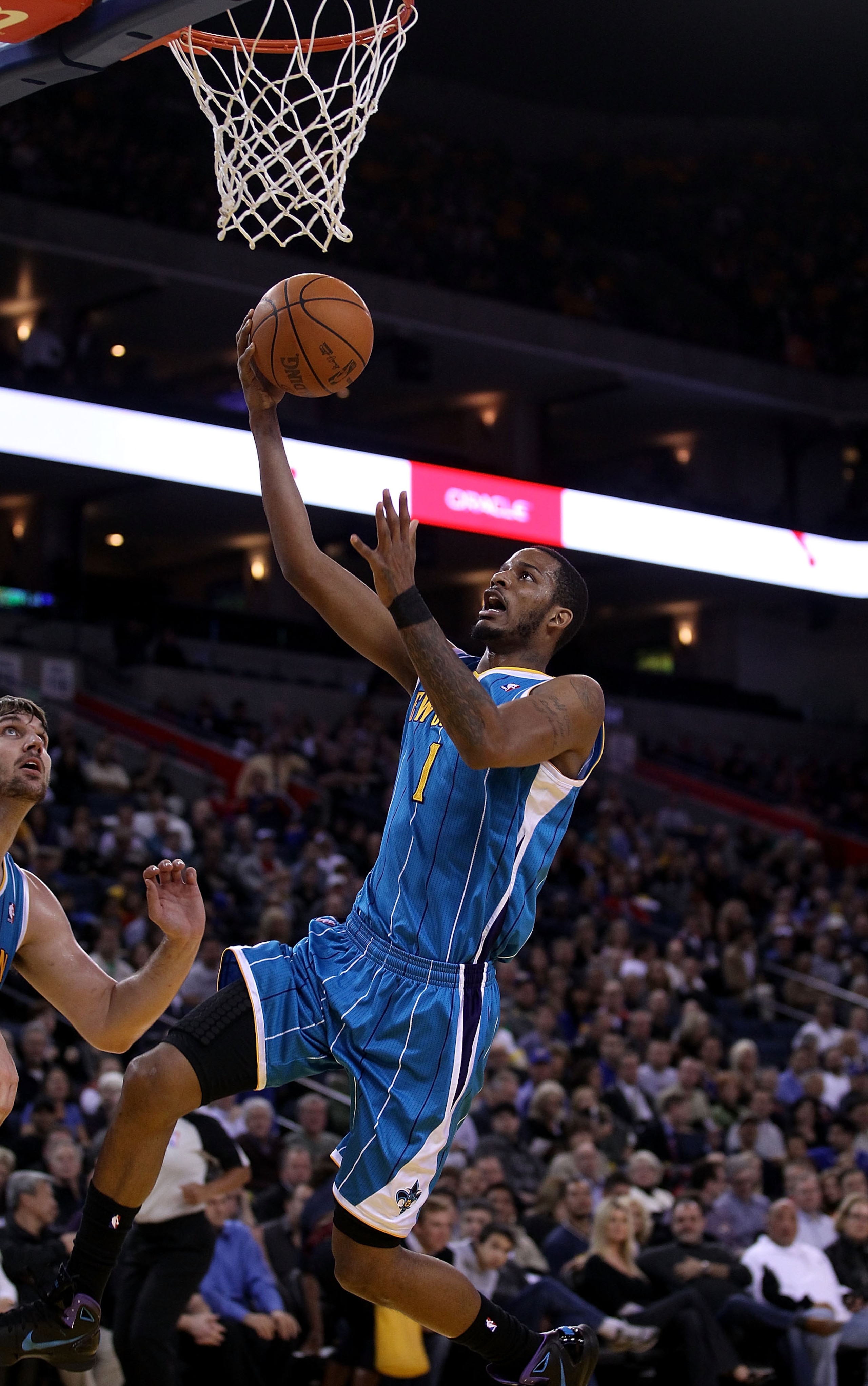 OAKLAND, CA - FEBRUARY 15:  Trevor Ariza #1 of the New Orleans Hornets goes up for a layup against the Golden State Warriors at Oracle Arena on February 15, 2011 in Oakland, California. NOTE TO USER: User expressly acknowledges and agrees that, by downloa