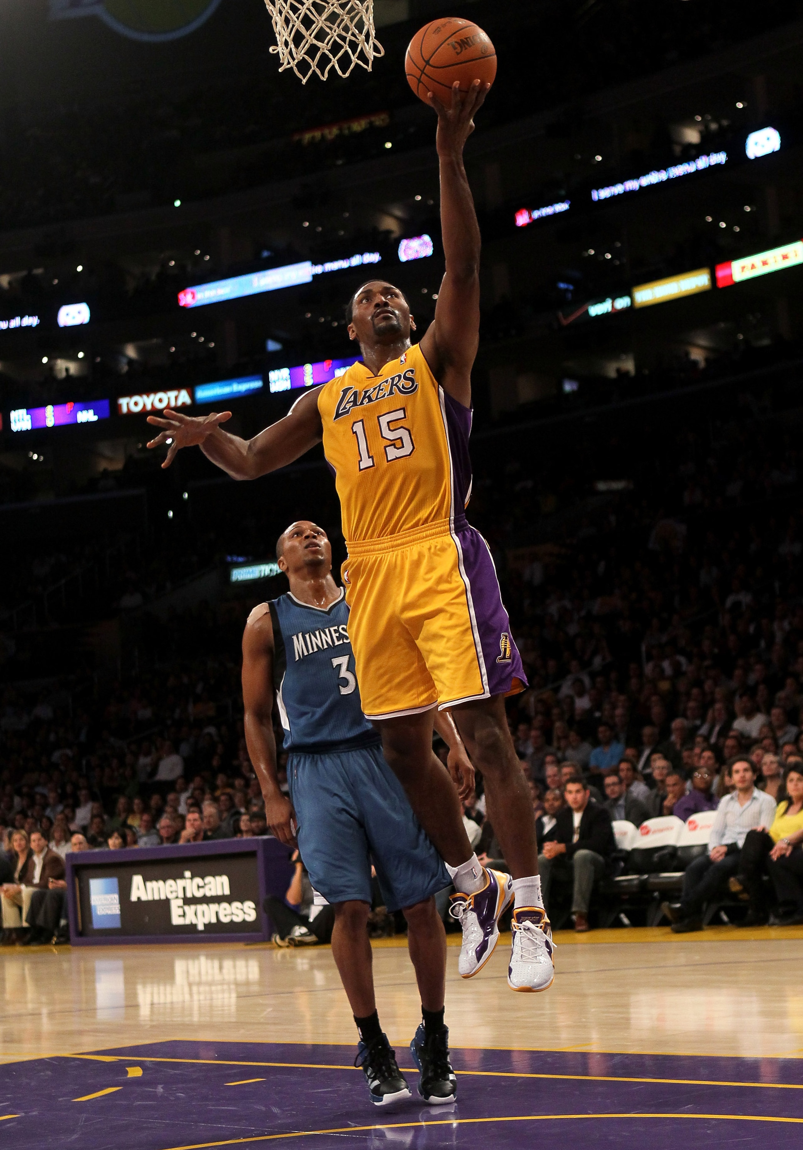 LOS ANGELES, CA - NOVEMBER 09:  Ron Artest #15 of the Los Angeles Lakers shoots over Sebastian Telfair #3 of the Minnesota Timberwolves at Staples Center on November 5, 2010 in Los Angeles, California.  The Lakers won 99-94.  NOTE TO USER: User expressly