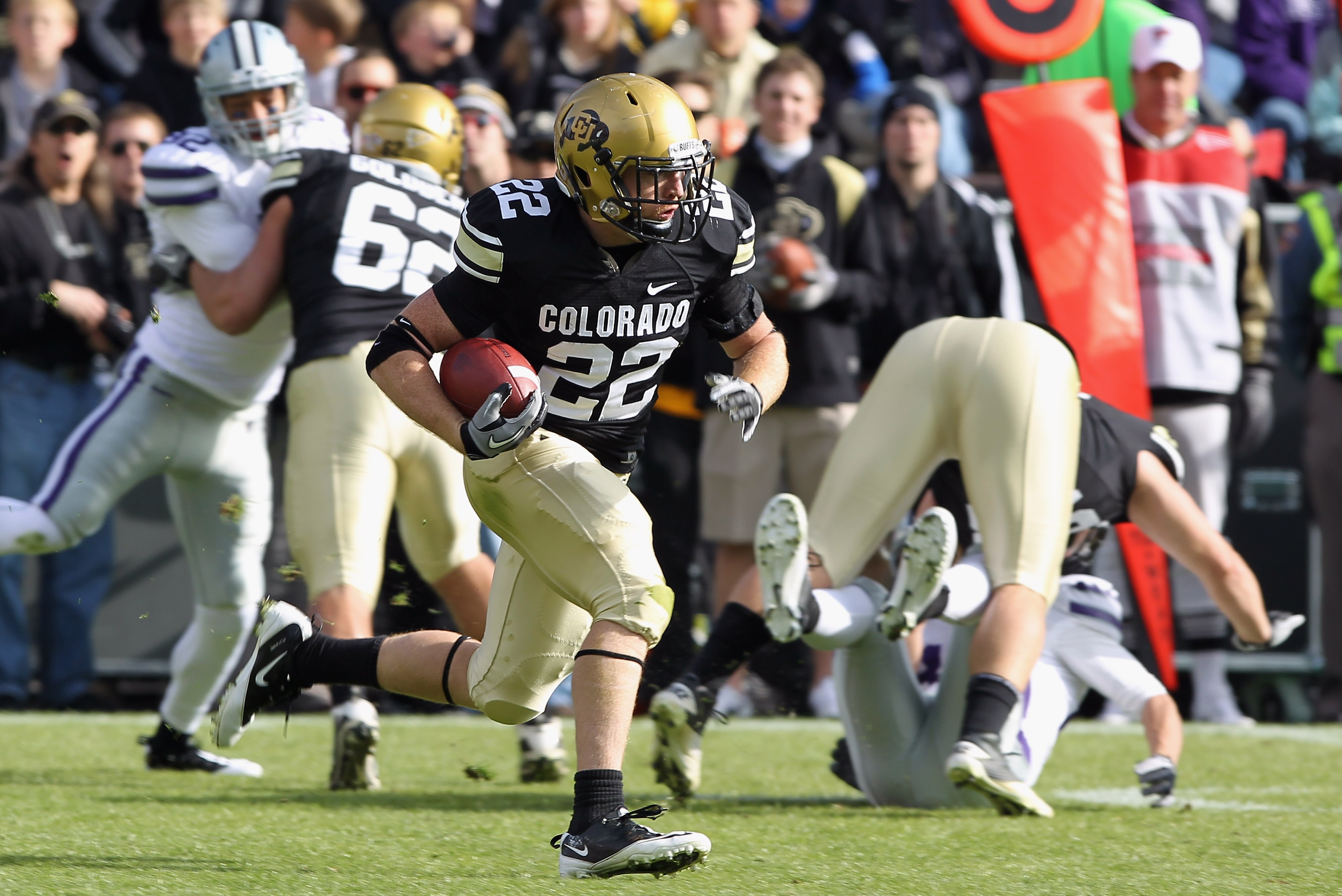 BOULDER, CO - NOVEMBER 20:  Arthur Jaffee #22 of the Colorado Buffaloes returns a kick off against the Kansas State Wildcats at Folsom Field on November 20, 2010 in Boulder, Colorado.  (Photo by Doug Pensinger/Getty Images)