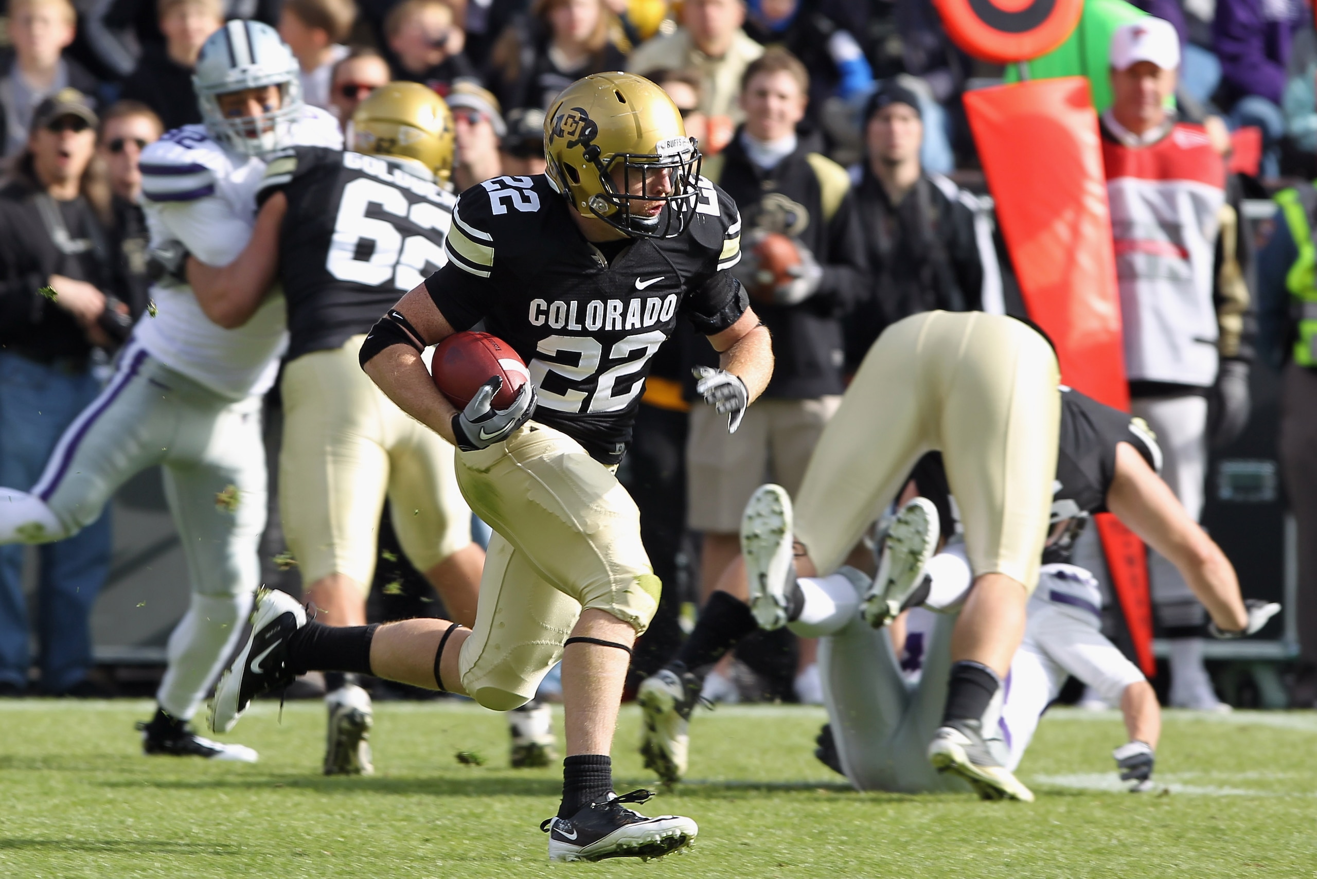 BOULDER, CO - NOVEMBER 20:  Arthur Jaffee #22 of the Colorado Buffaloes returns a kick off against the Kansas State Wildcats at Folsom Field on November 20, 2010 in Boulder, Colorado.  (Photo by Doug Pensinger/Getty Images)
