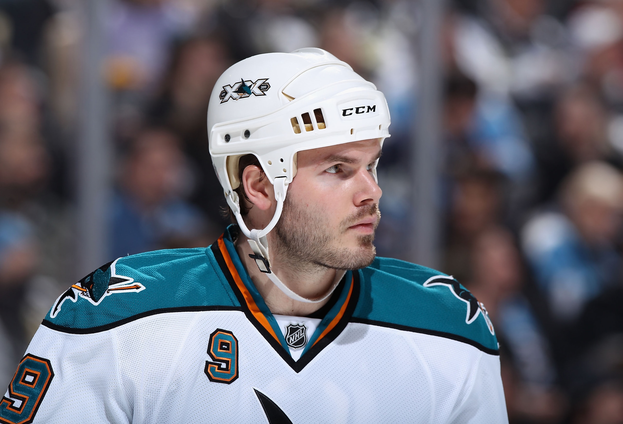 PITTSBURGH, PA - FEBRUARY 23: Ian White #9 of the San Jose Sharks during the NHL game against the Pittsburgh Penguins at Consol Energy Center on February 23, 2011 in Pittsburgh, Pennsylvania. The Sharks defeated the Penguins 3-2 in overtime. (Photo by C PITTSBURGH, PA - FEBRUARY 23: Ian White #9 of the San Jose Sharks during the NHL game against the Pittsburgh Penguins at Consol Energy Center on February 23, 2011 in Pittsburgh, Pennsylvania. The Sharks defeated the Penguins 3-2 in overtime. (Photo by C