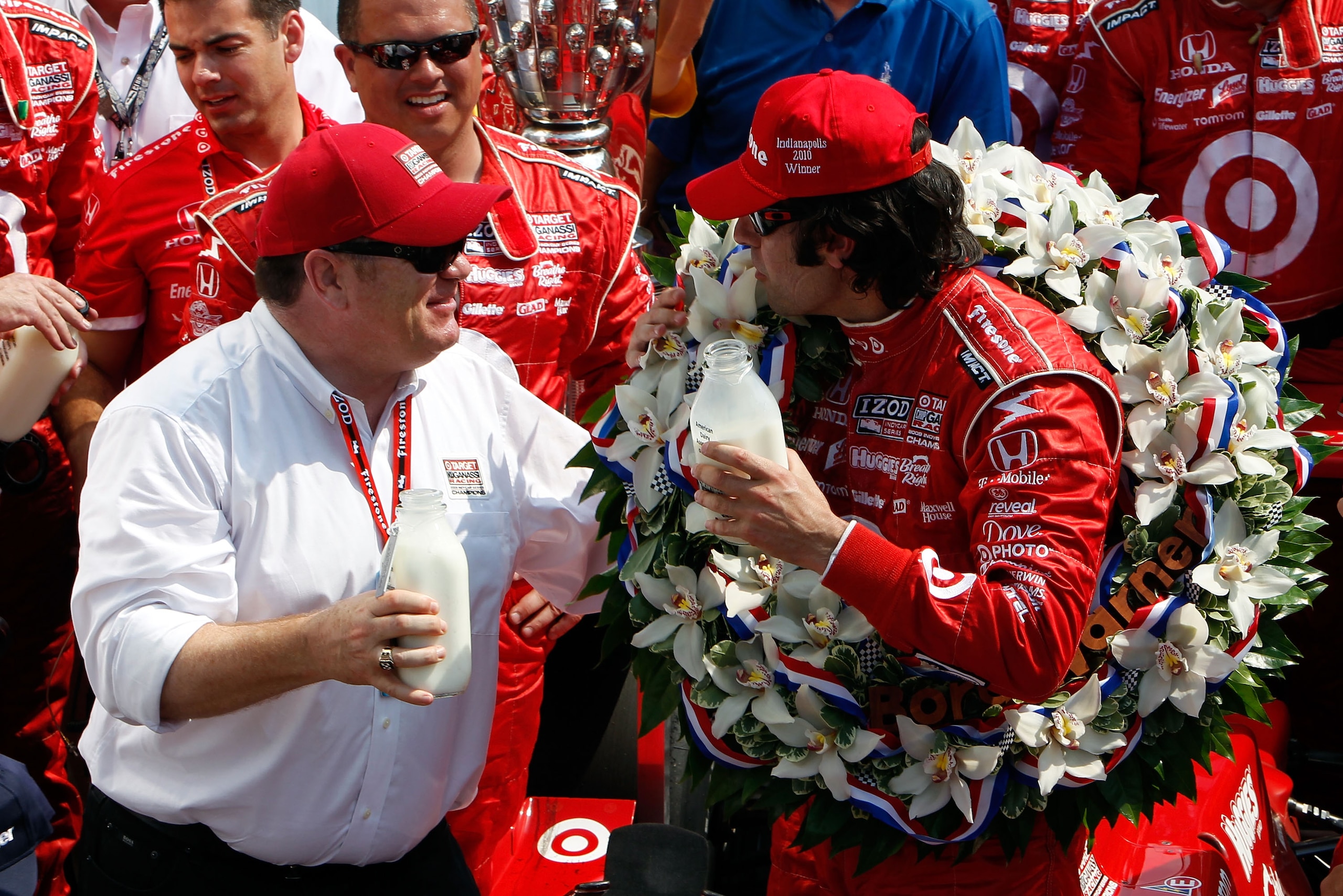 INDIANAPOLIS - MAY 30:  Dario Franchitti of Scotland, driver of the #10 Target Chip Ganassi Racing Dallara Honda, celebrates with team owner Chip Ganassi (L) in victory lane after winning the IZOD IndyCar Series 94th running of the Indianapolis 500 at the