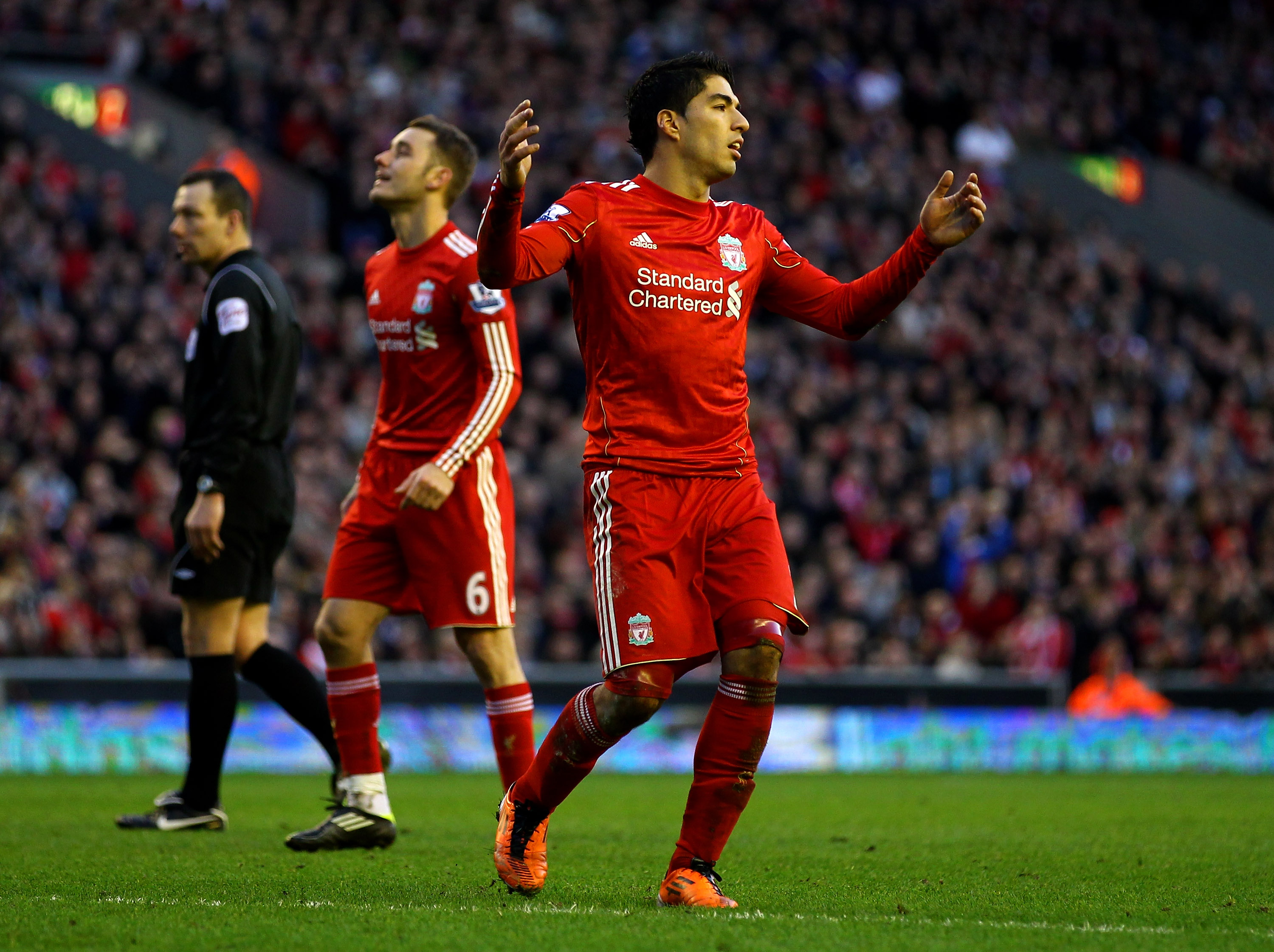 LIVERPOOL, ENGLAND - FEBRUARY 12:  Luis Suarez of Liverpool reacts to a missed chance during the Barclays Premier League match between Liverpool and Wigan Athletic at Anfield on February 12, 2011 in Liverpool, England.  (Photo by Clive Brunskill/Getty Ima