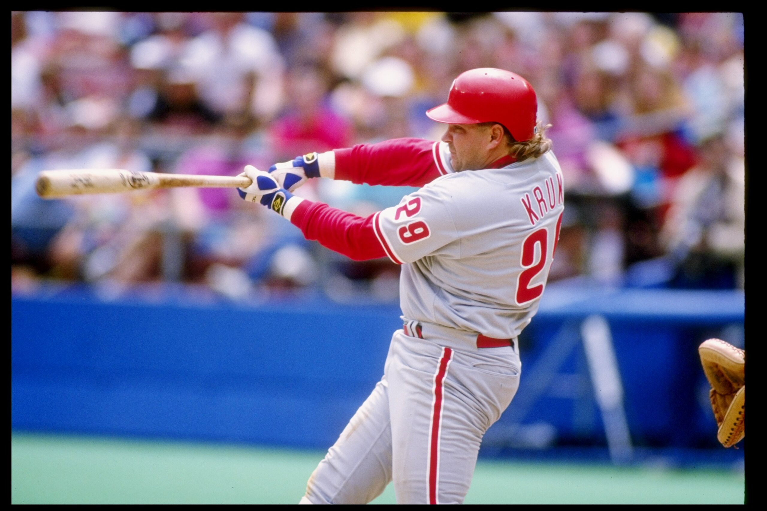 19 Apr 1992: Infielder John Kruk of the Philadelphia Phillies swings at the ball during a game against the Pittsburgh Pirates at Three Rivers Stadium in Pittsburgh, Pennsylvania.